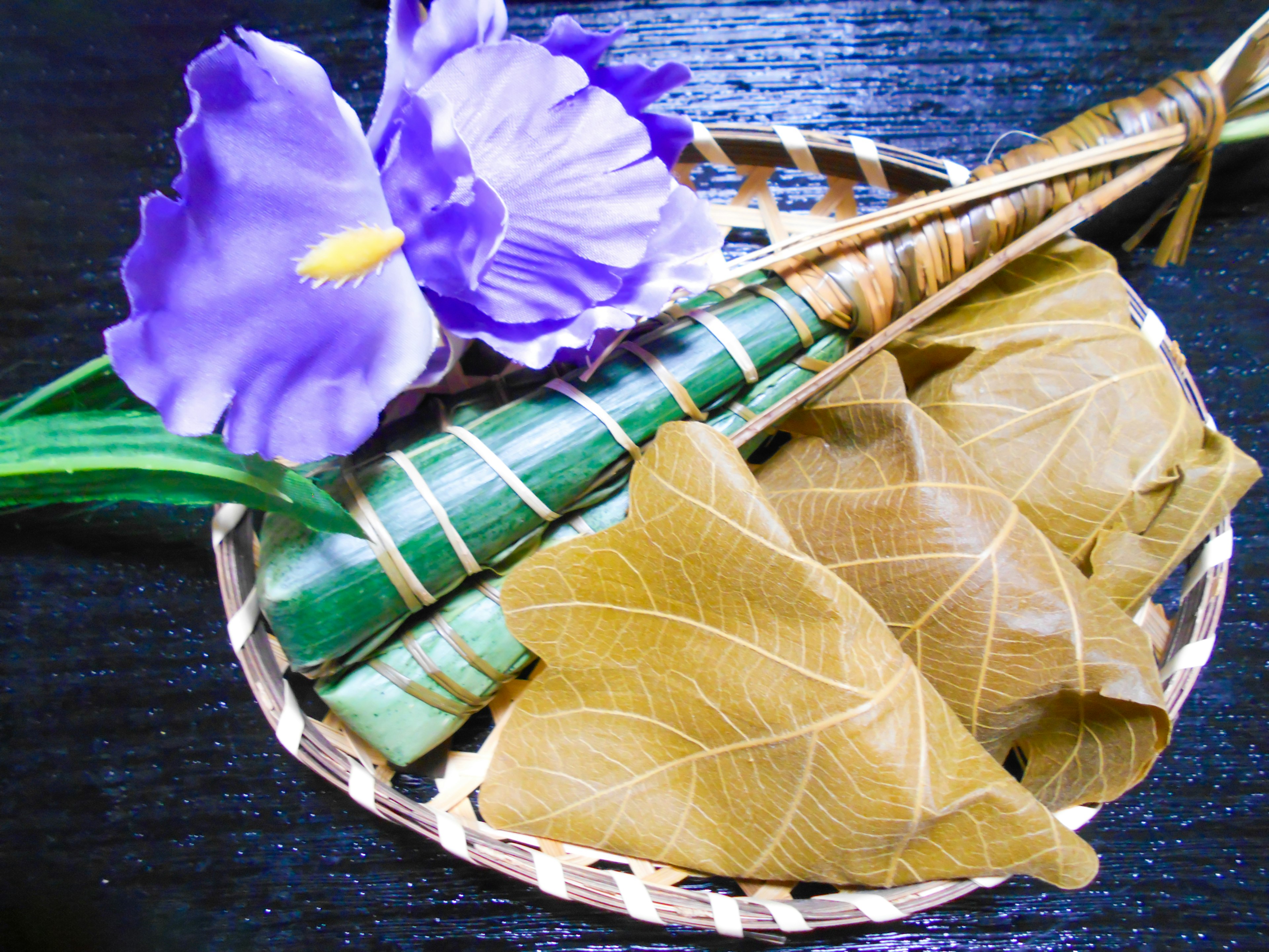 Beautiful arrangement of leaves and floral decoration in a basket