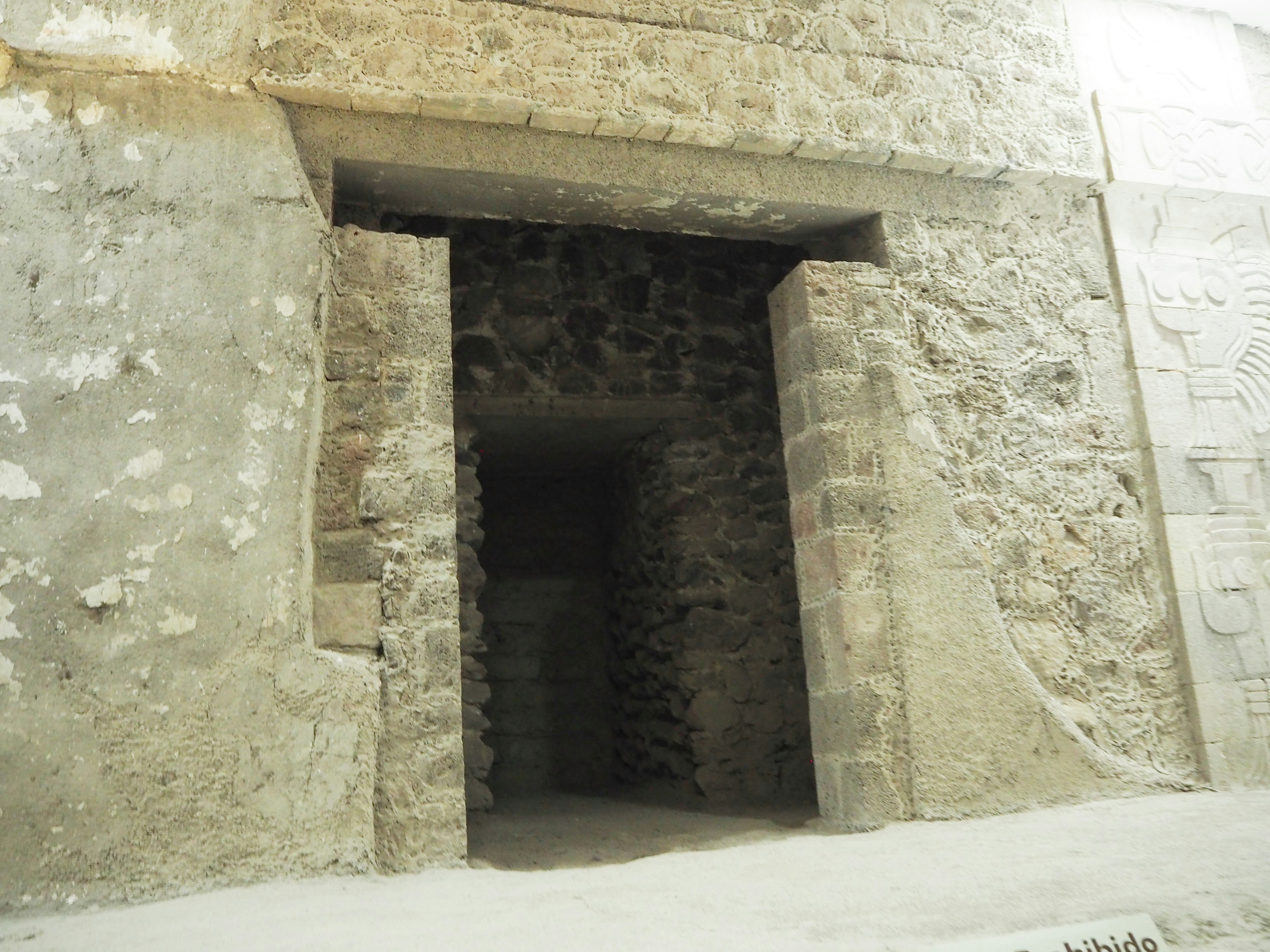 Interior view of an ancient stone entrance to a ruin