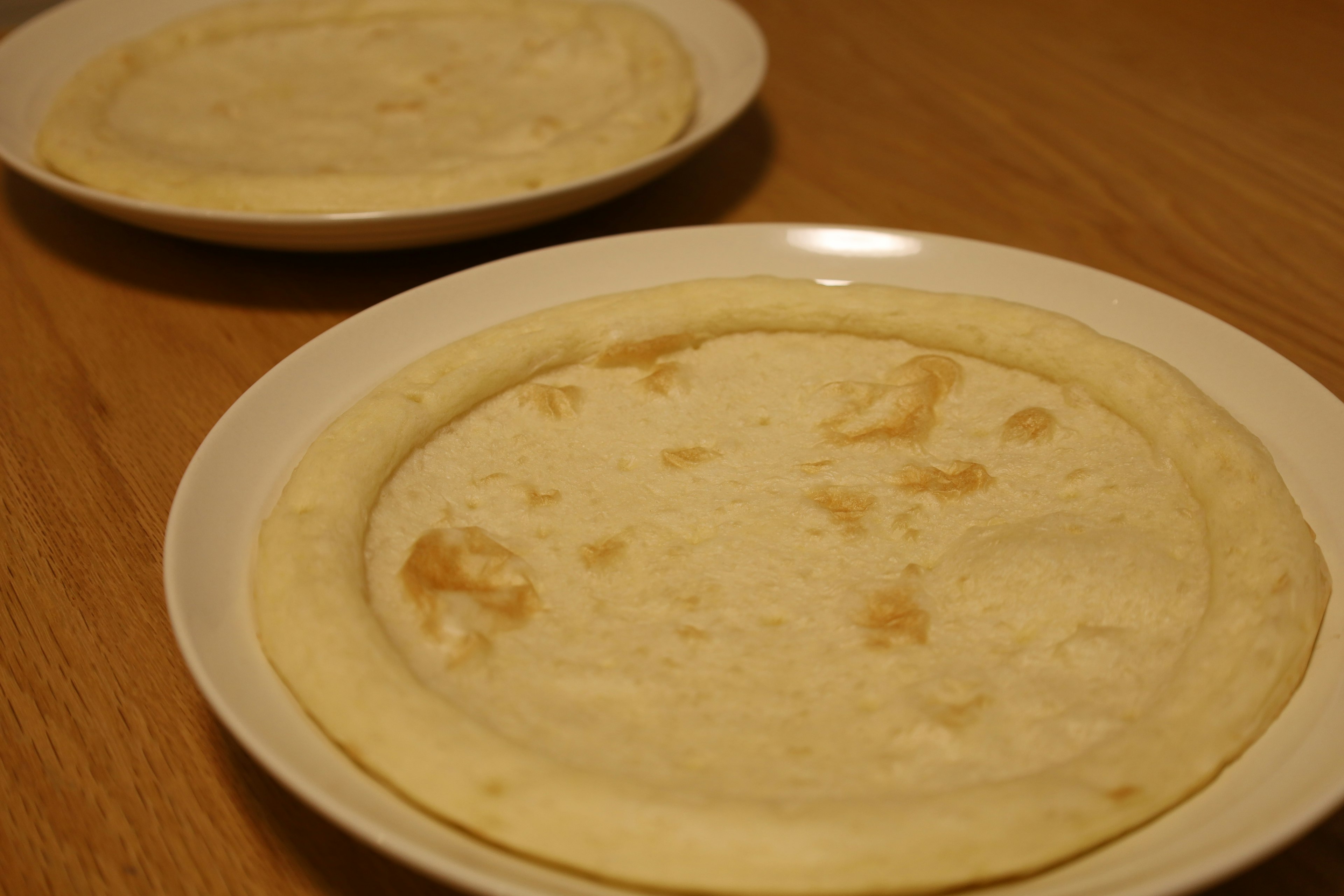 Two thin crepes on plates