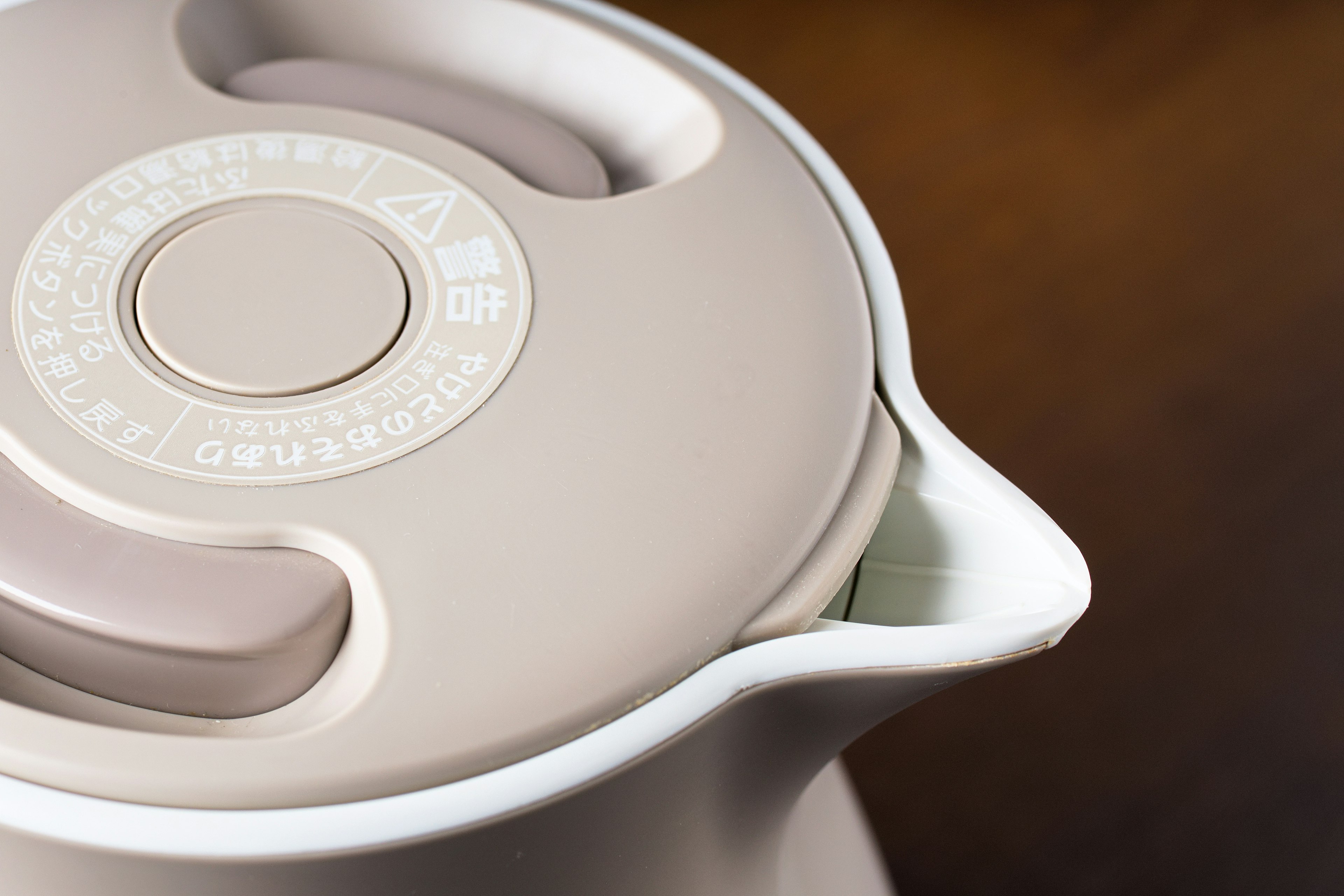 Top view of a beige and white teapot design