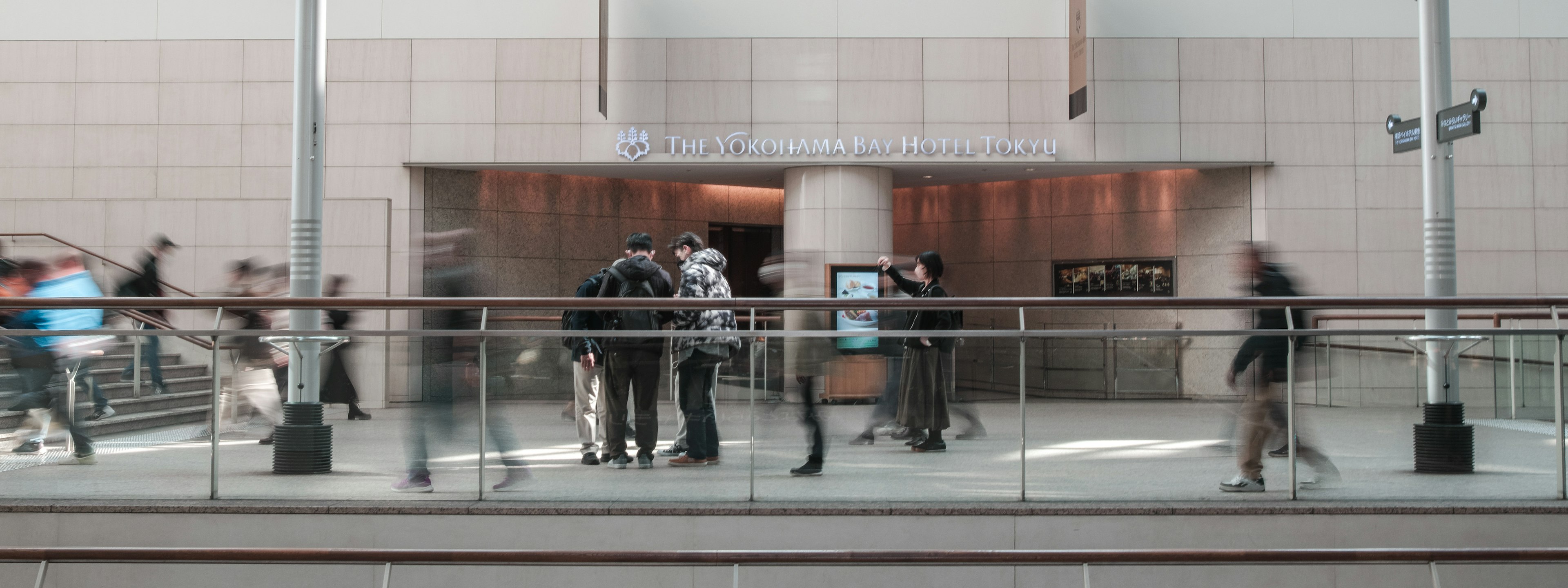 People gathering in a modern building interior