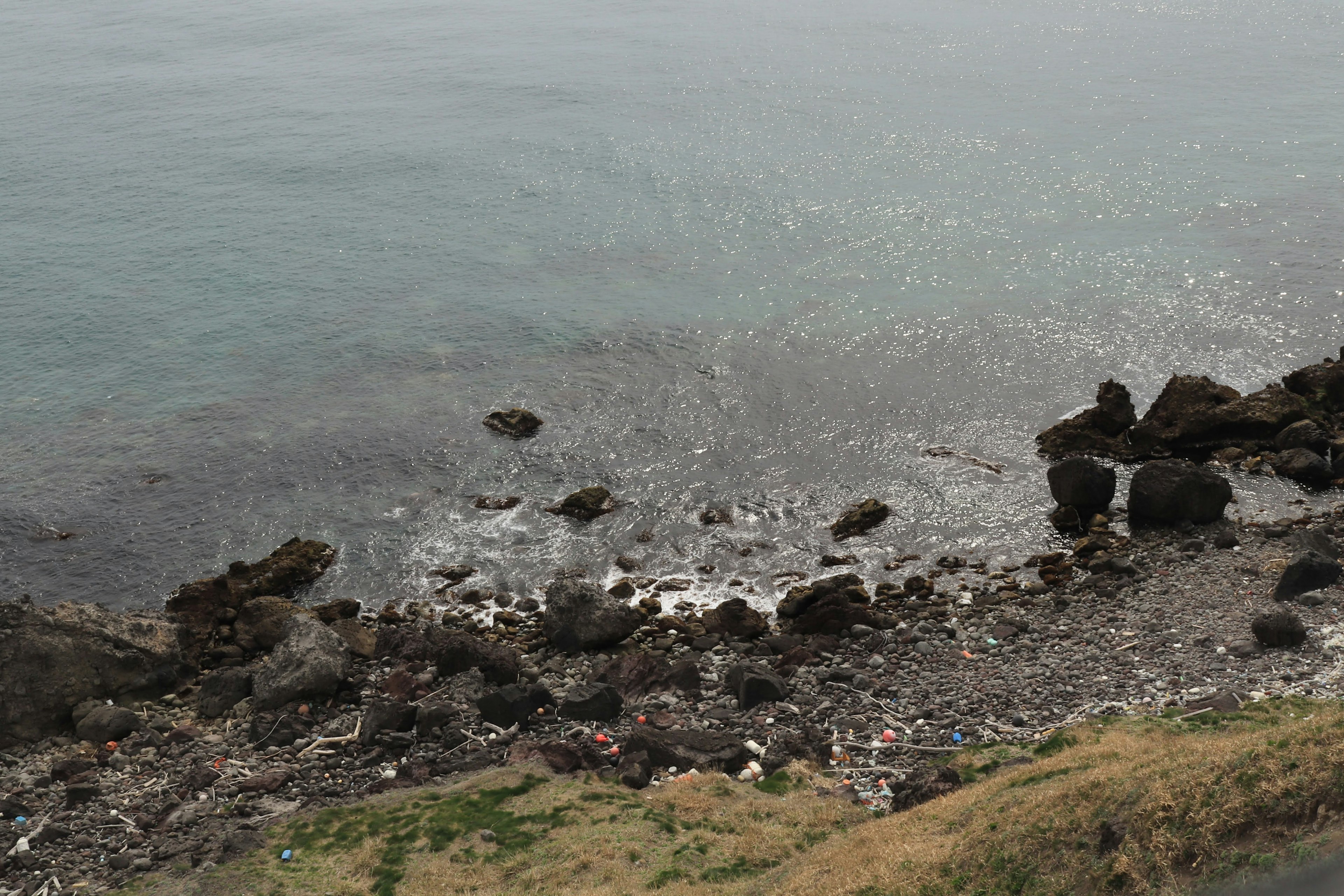 Coastal view with rocks and gentle waves