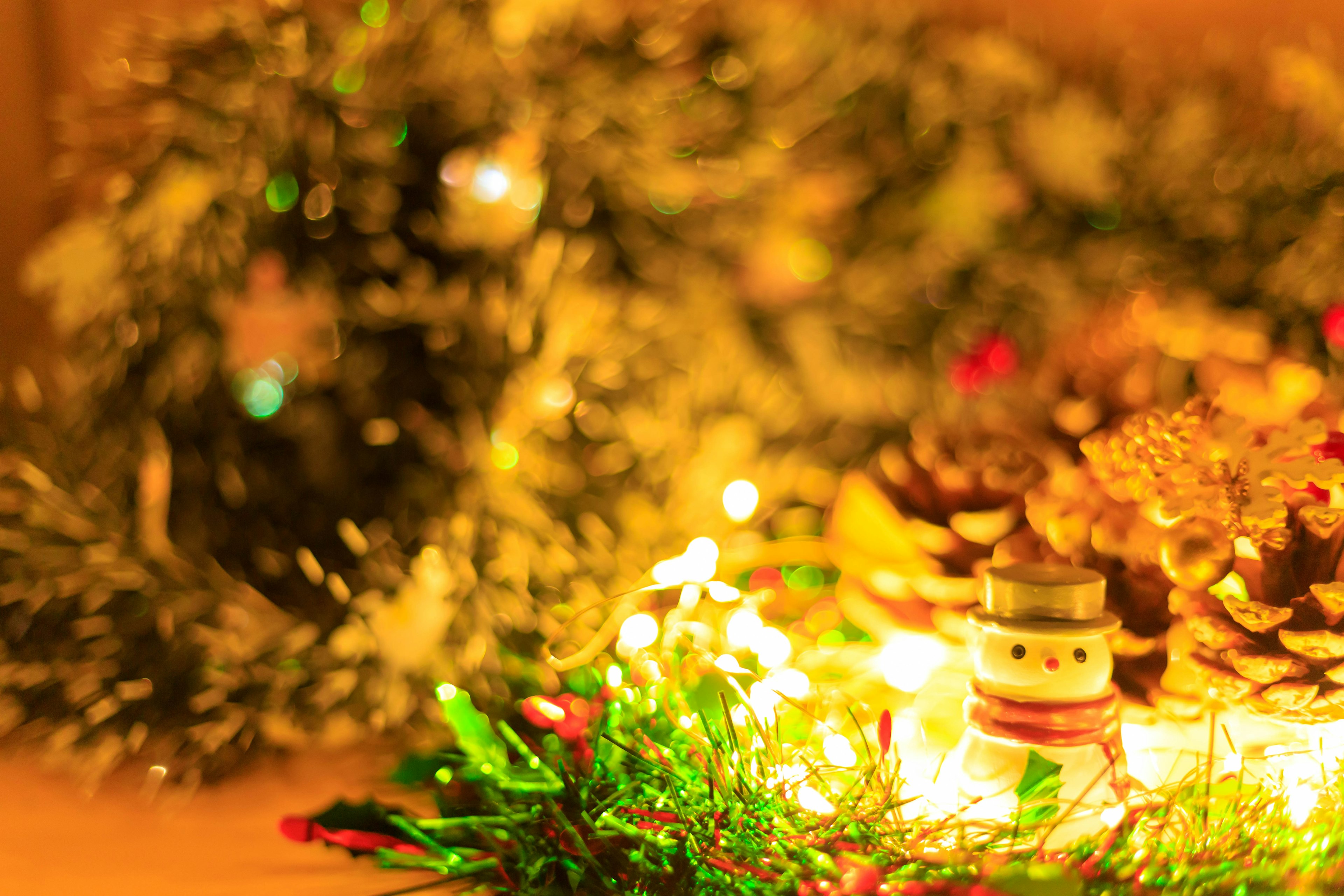 Warm image featuring Christmas decorations and glowing lights