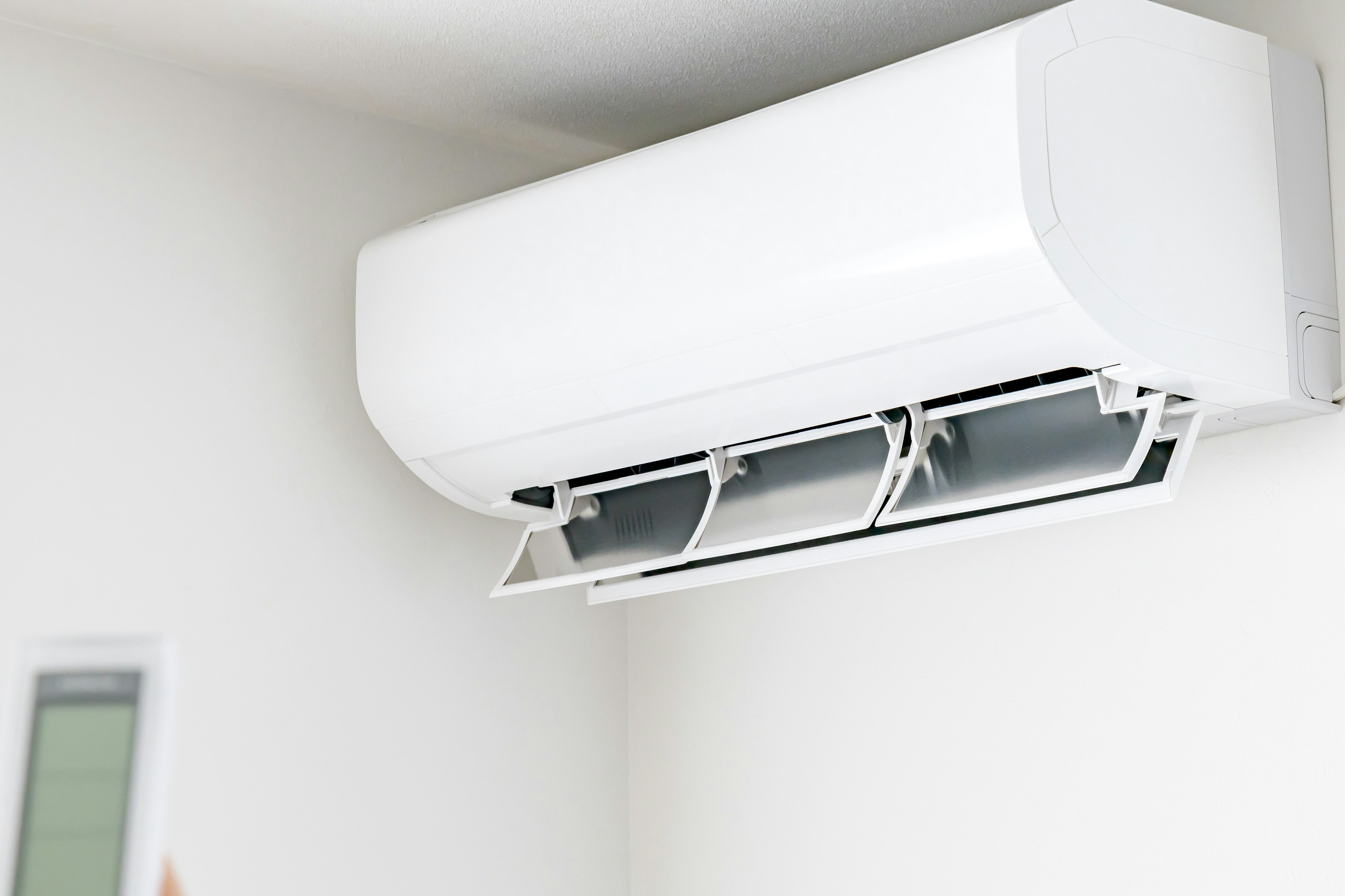 Air conditioning unit mounted on a white wall