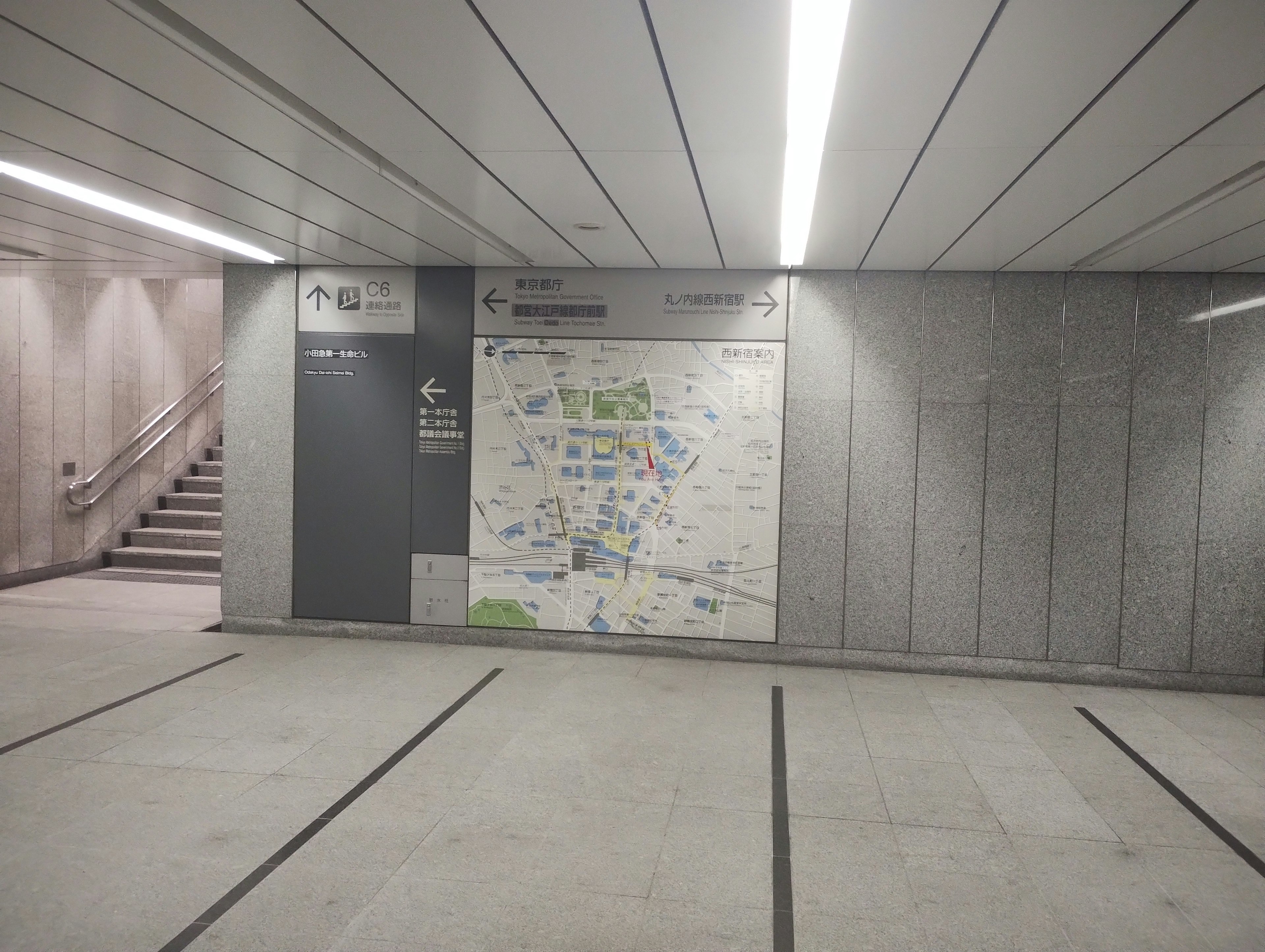 Map and signage on the wall of a subway station