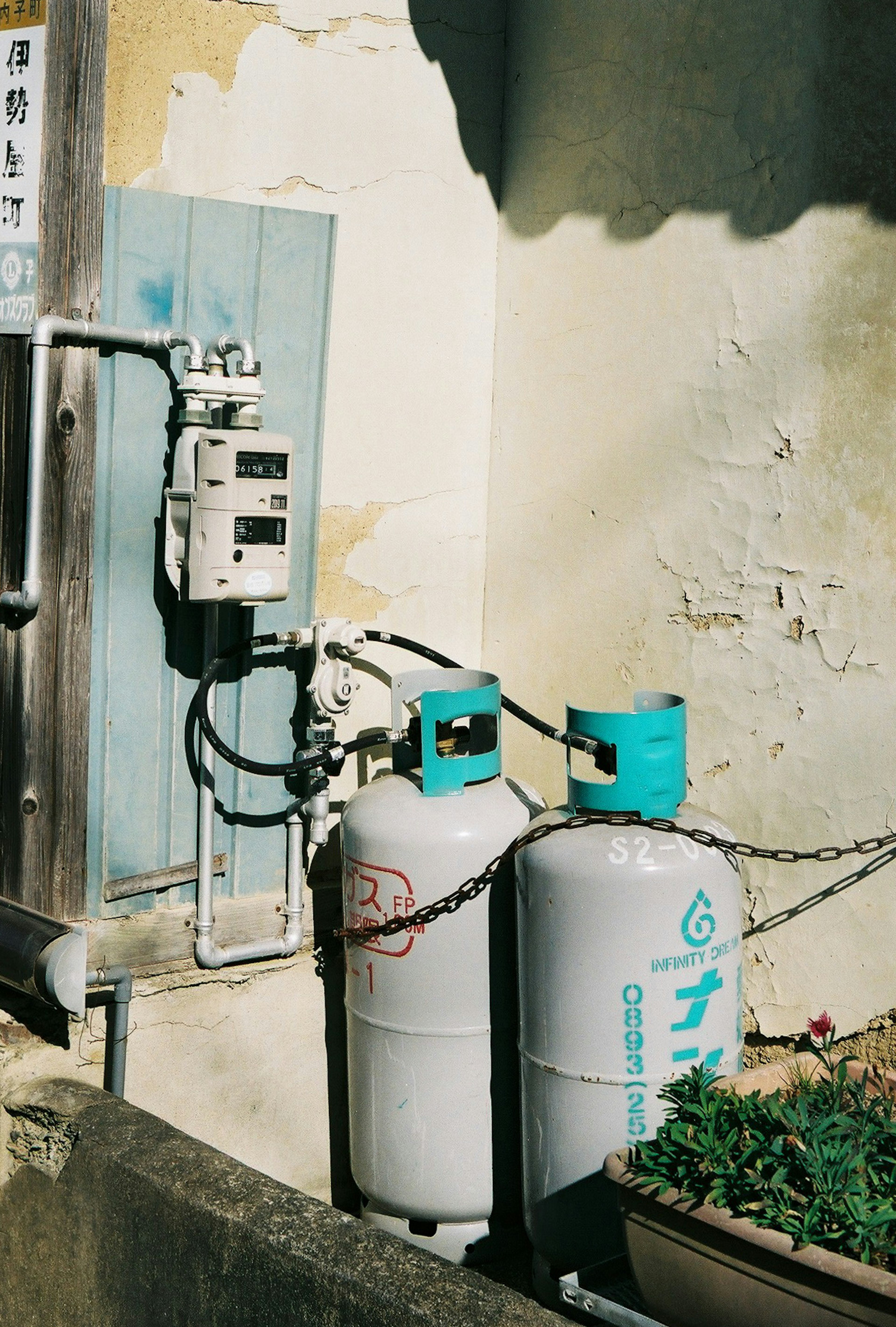 Gas cylinders and meter installed on a wall