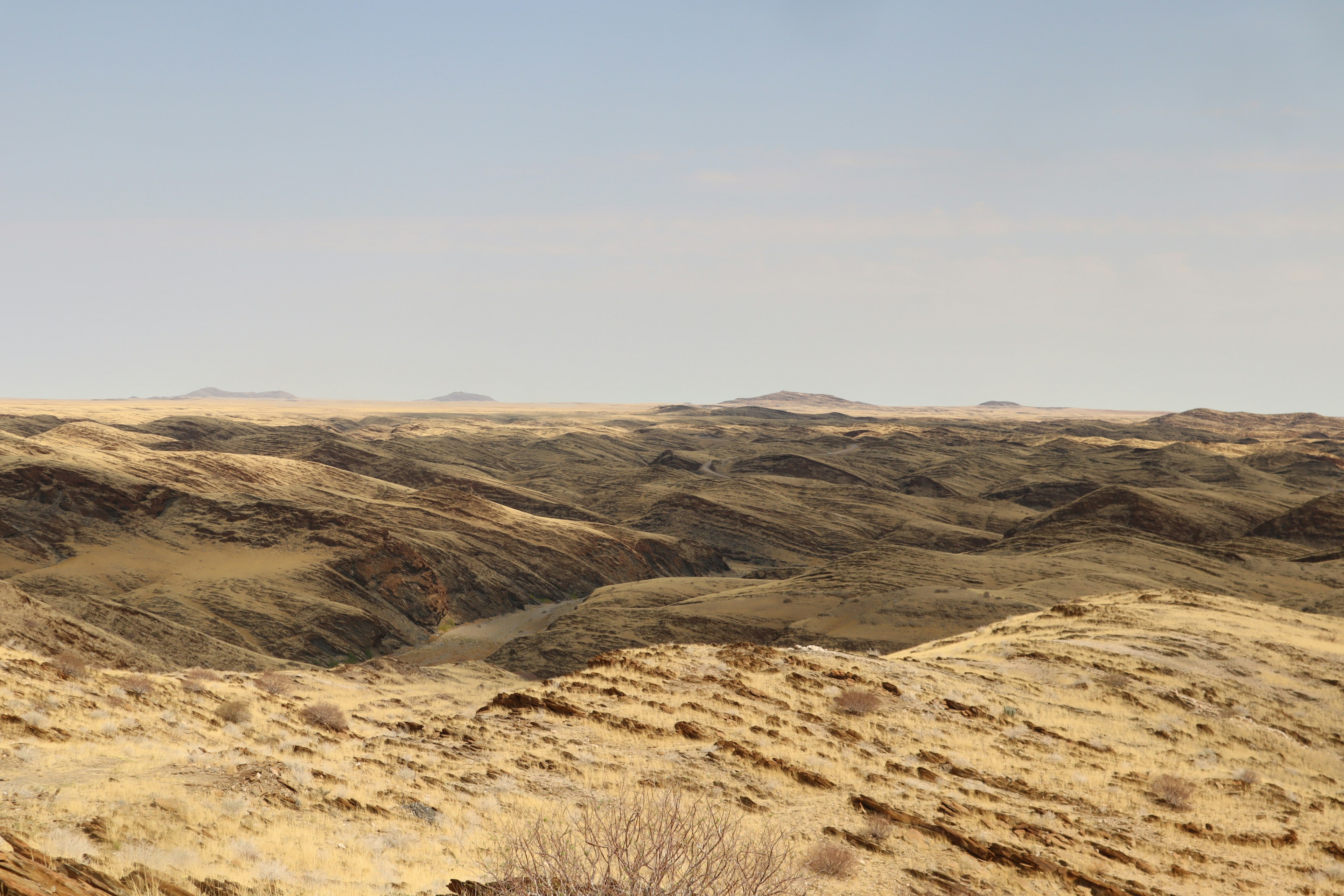 Expansive view of dry hilly terrain