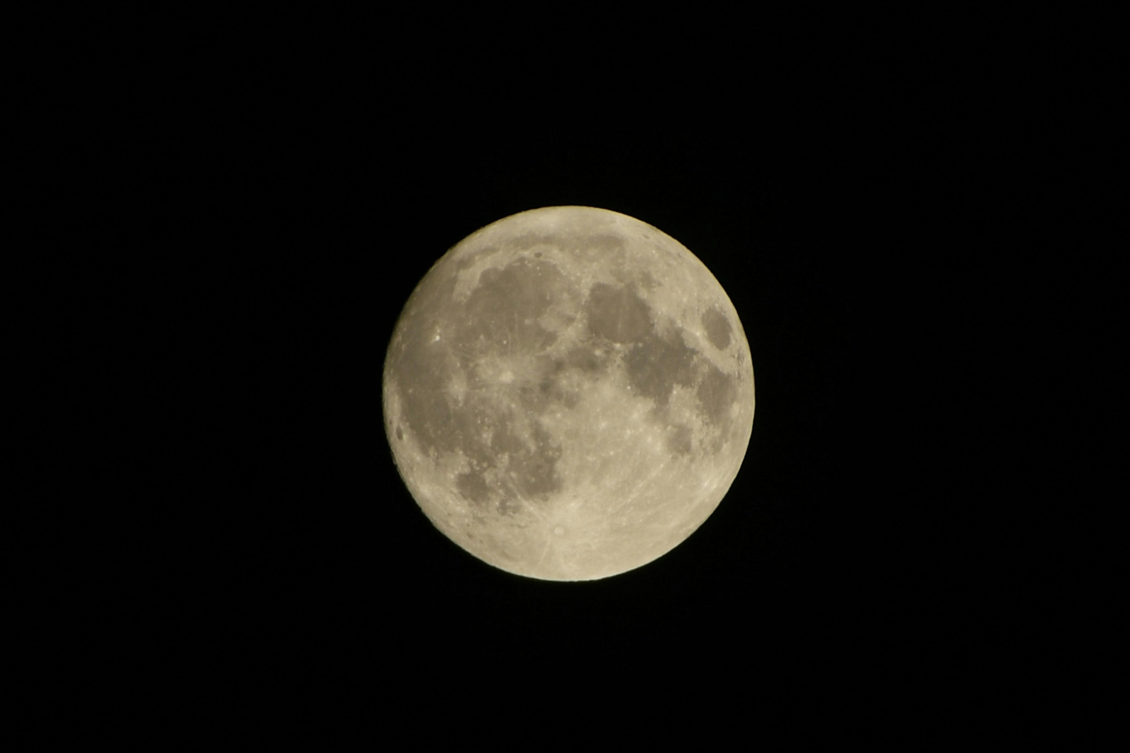 Close-up of a bright moon in the night sky