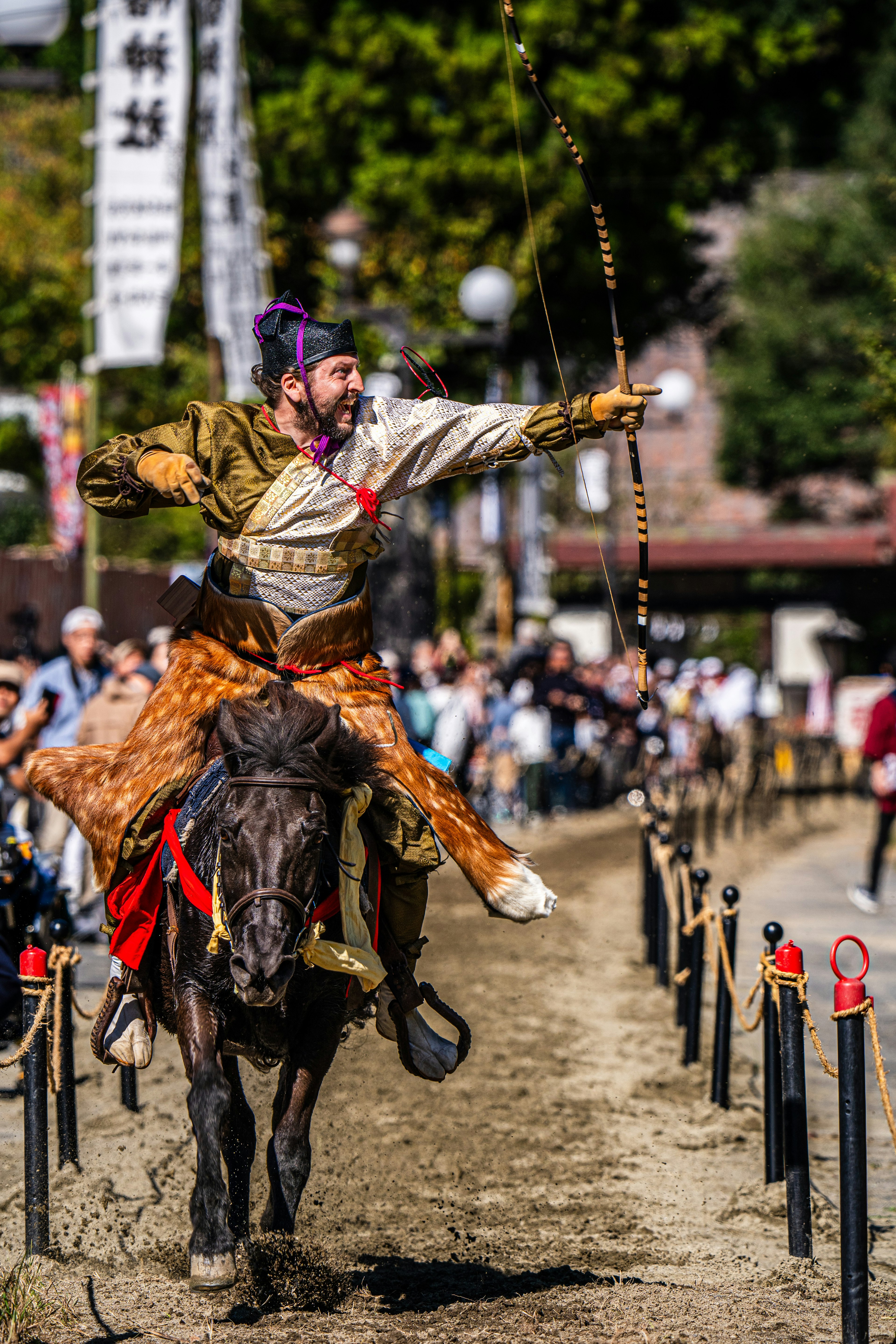 A mounted warrior brandishing a bow in a vibrant scene