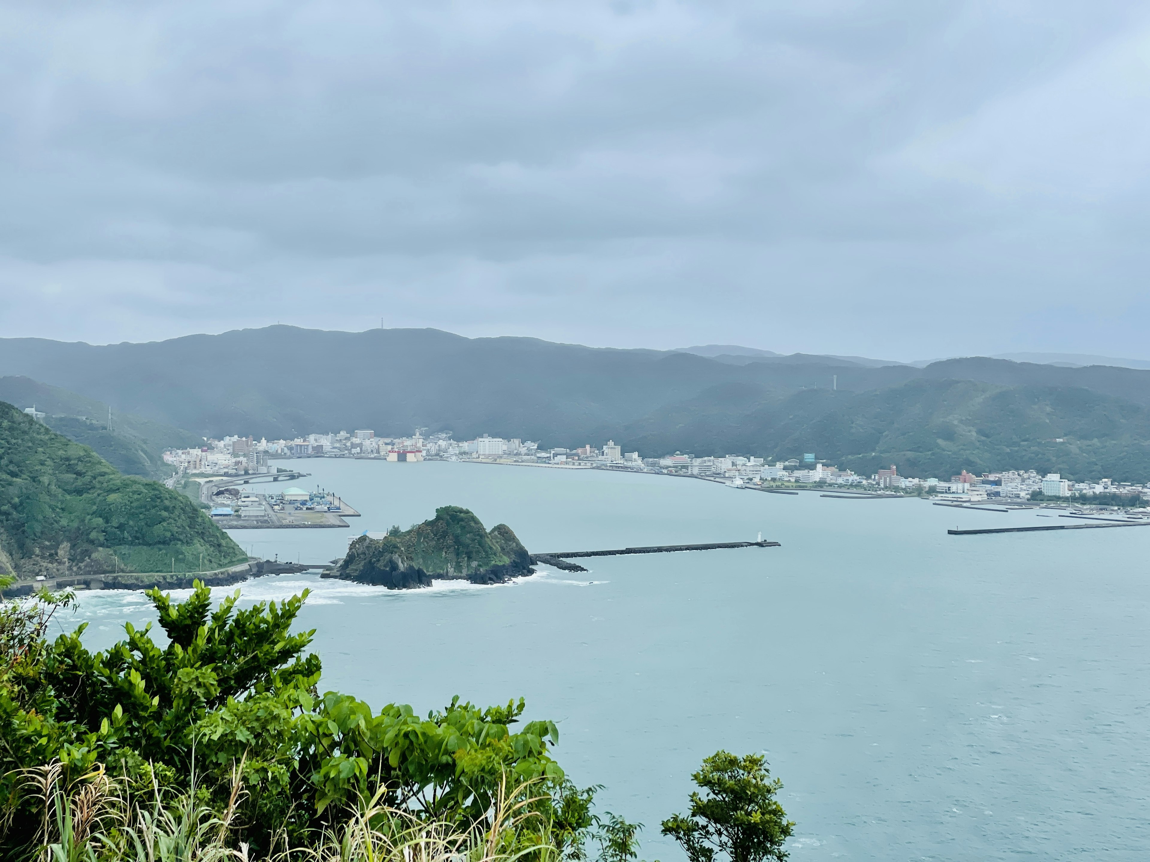 Scenic view of a coastline with a small island