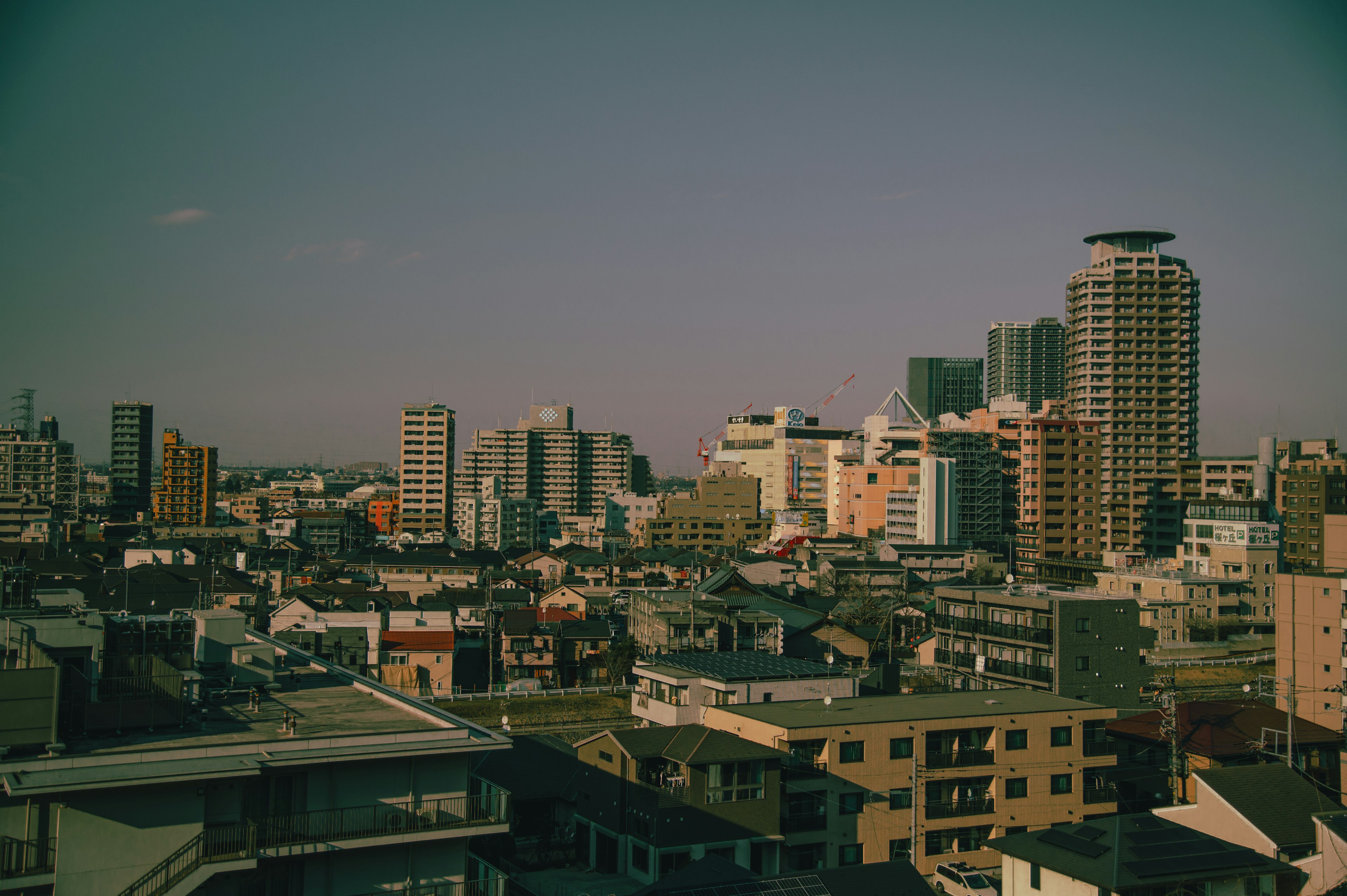 City skyline view featuring a mix of old buildings and modern skyscrapers