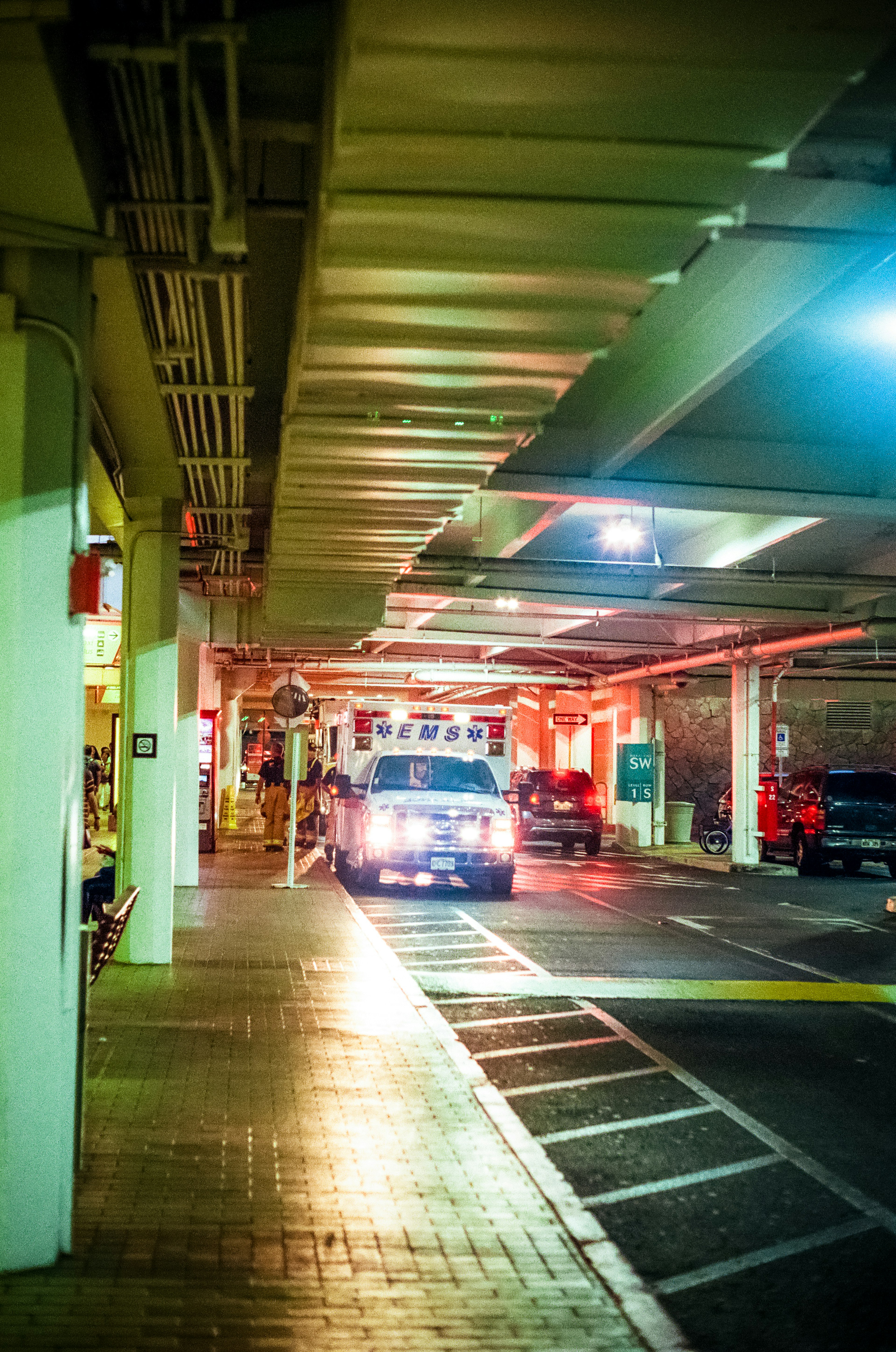 Emergency vehicle in a dimly lit parking garage