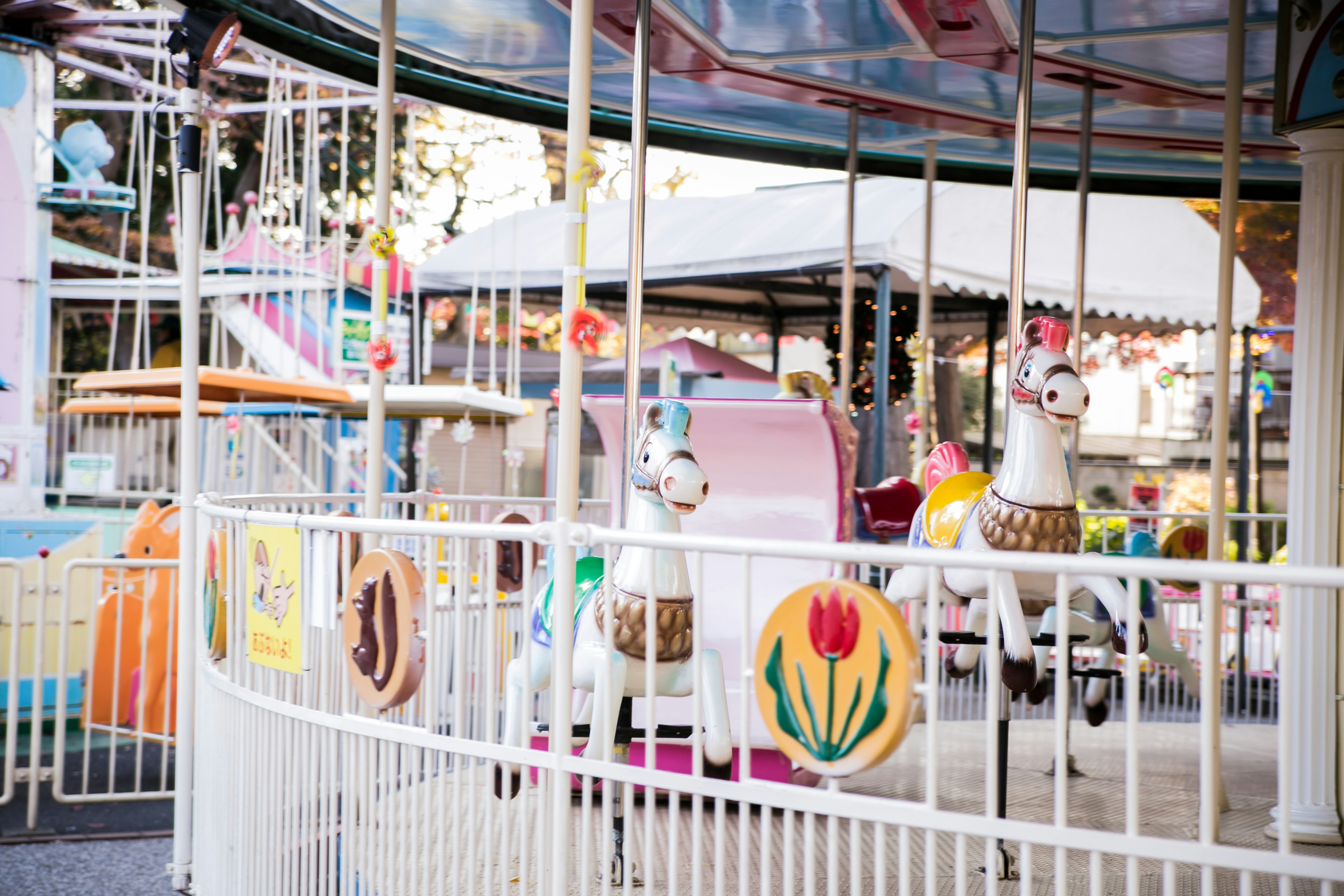 Colorful carousel horses with decorative elements