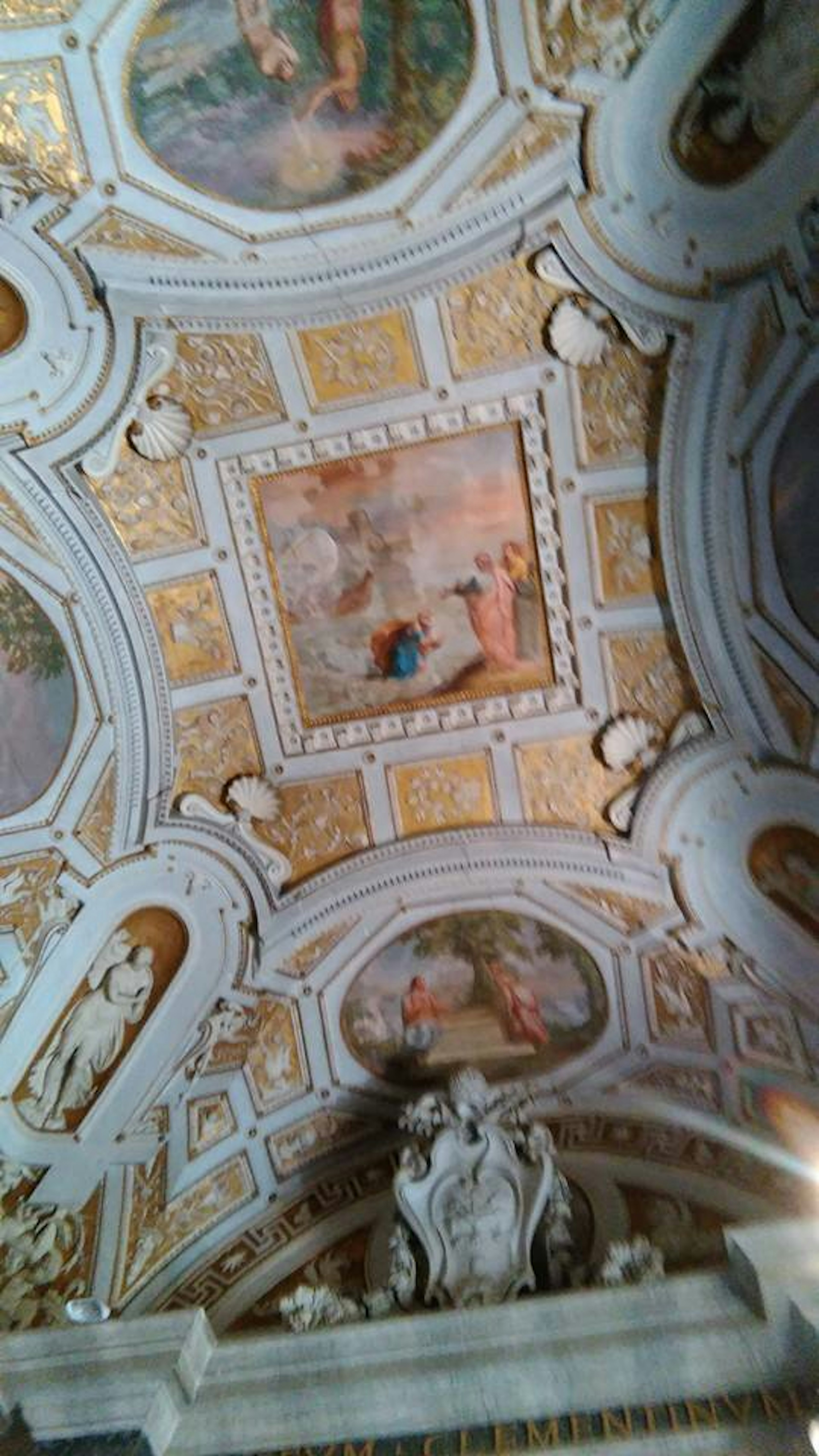 Magnificent ceiling with intricate decorations and paintings