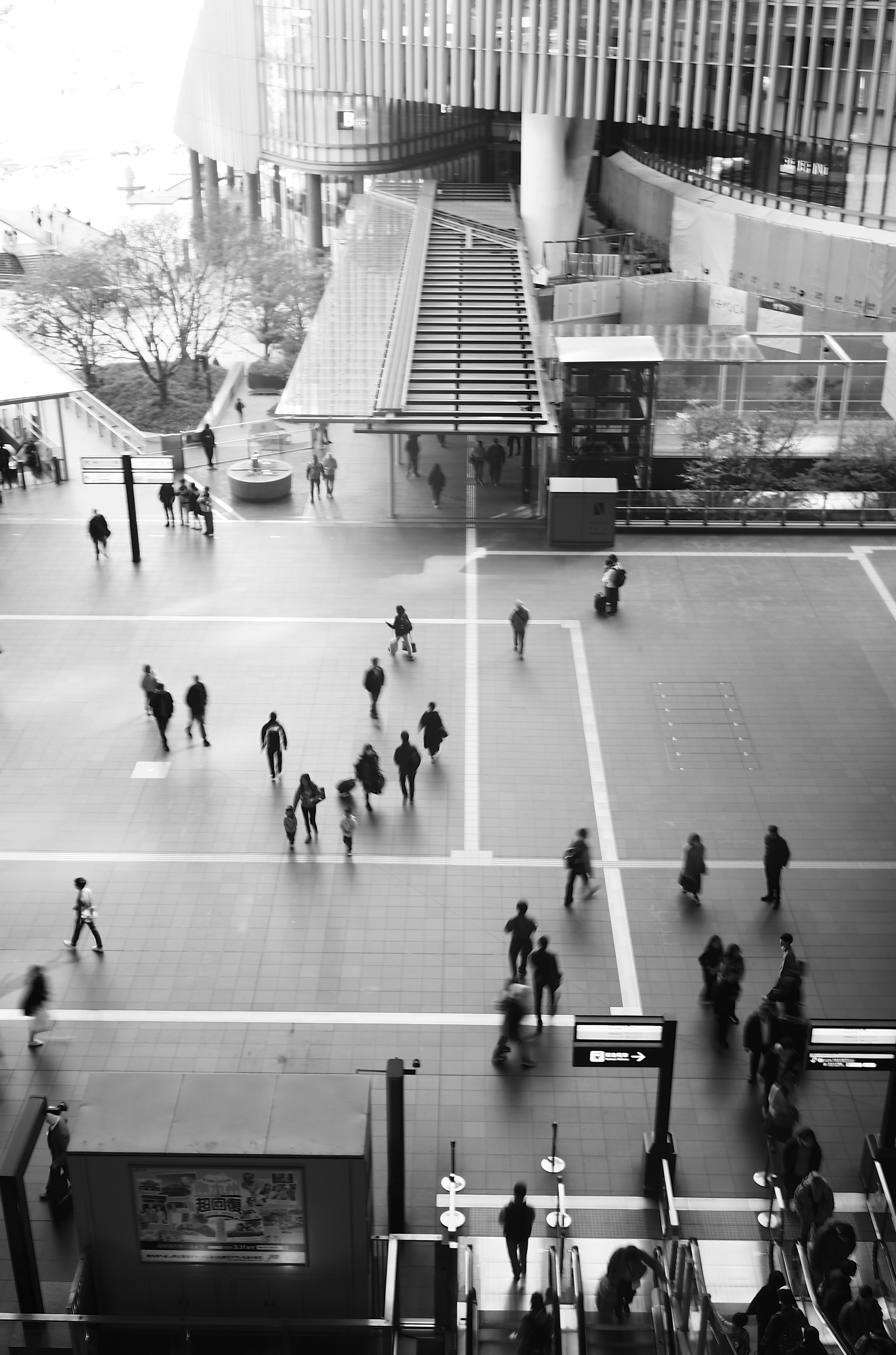 City square viewed from above with pedestrians walking