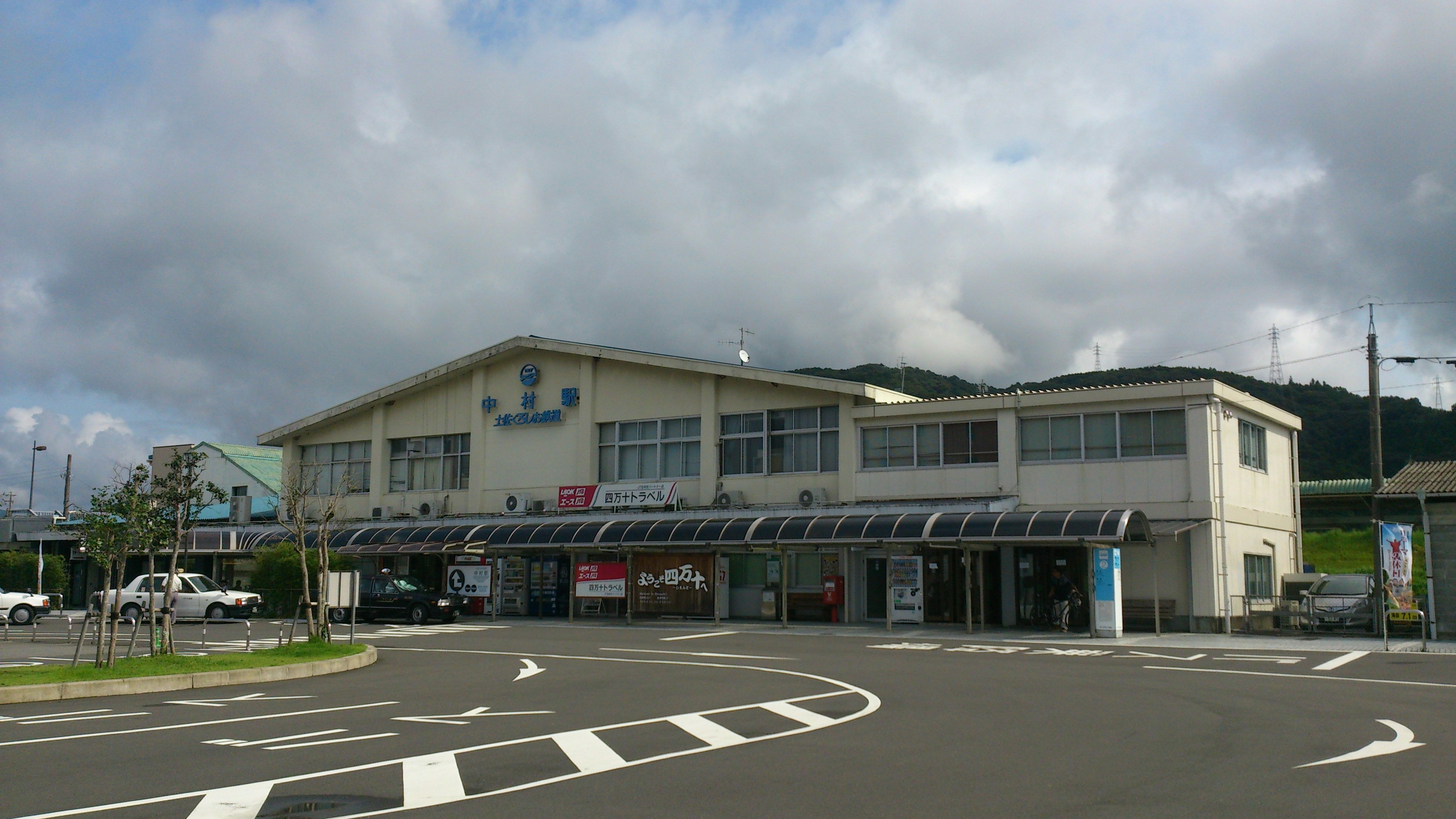 Exterior of a commercial building with surrounding traffic