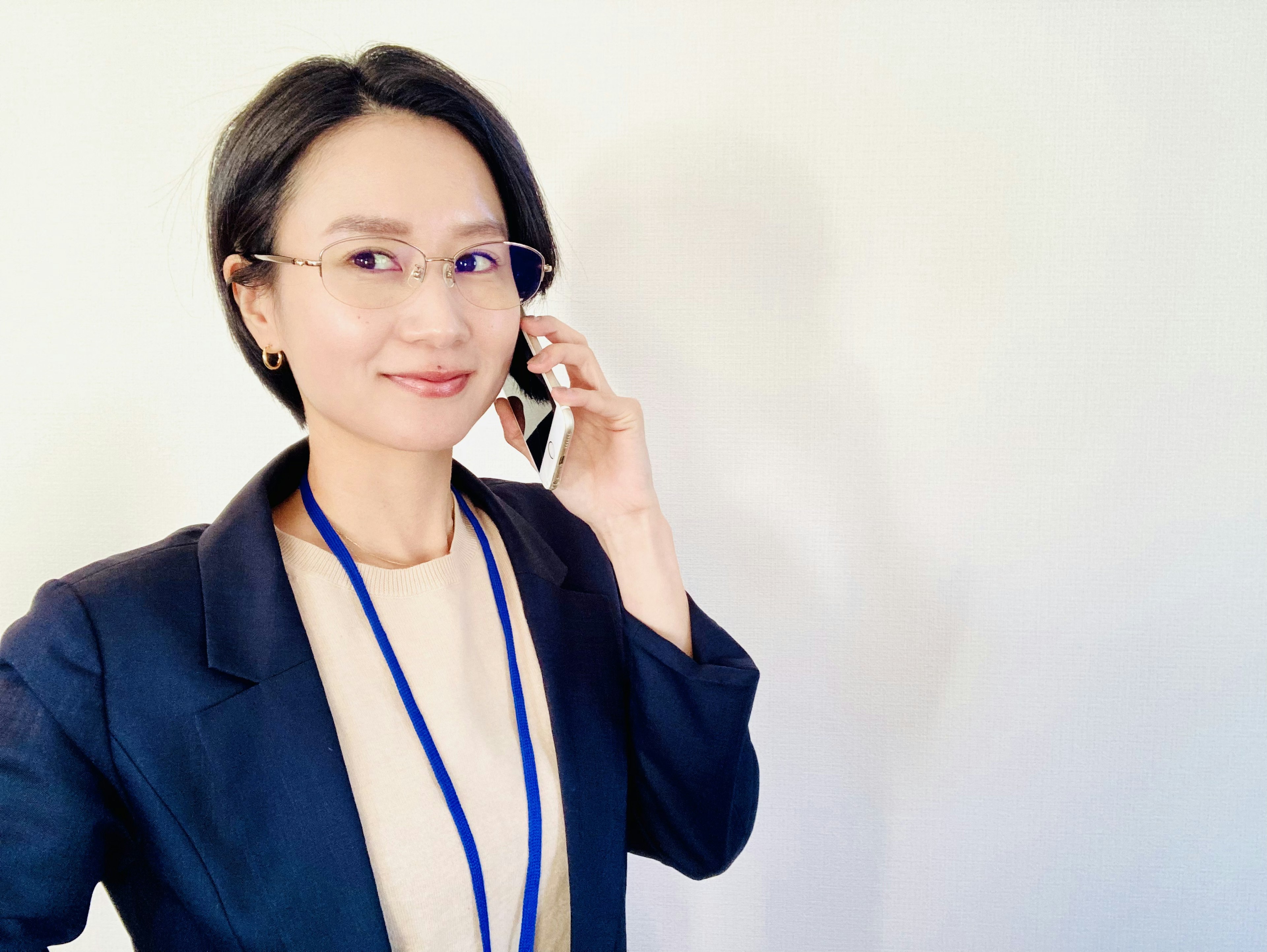 Businesswoman talking on the phone with a professional appearance