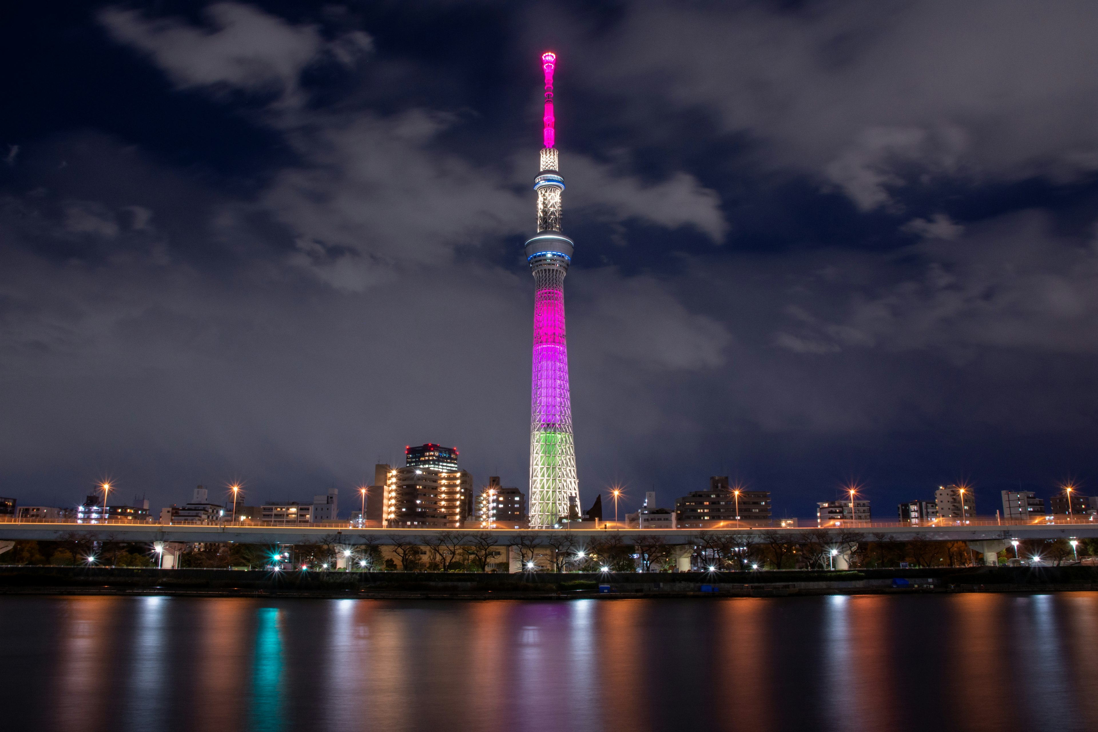 Tokyo Skytree illuminated at night with colorful lights