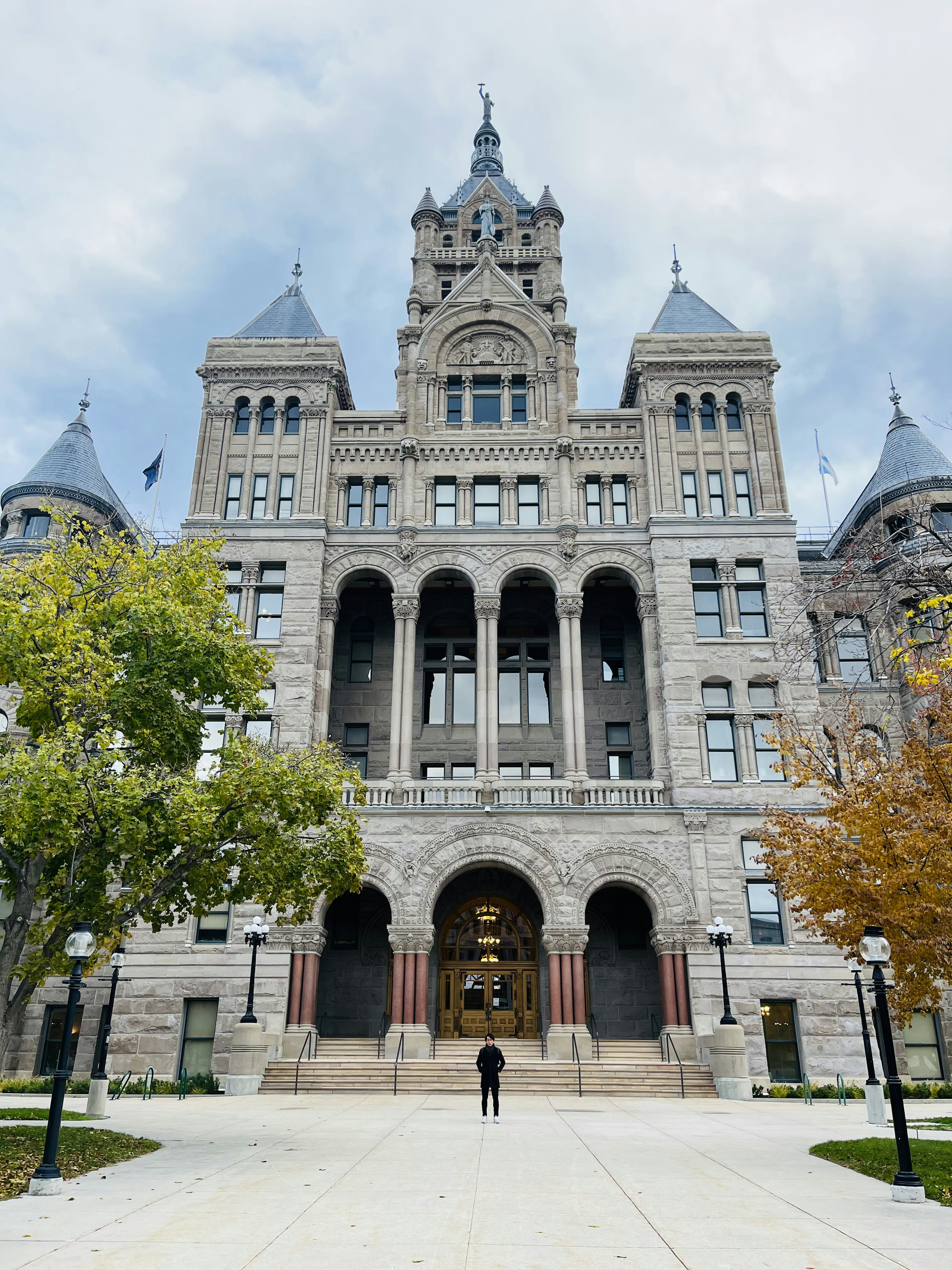 Imposing stone building featuring a city hall facade