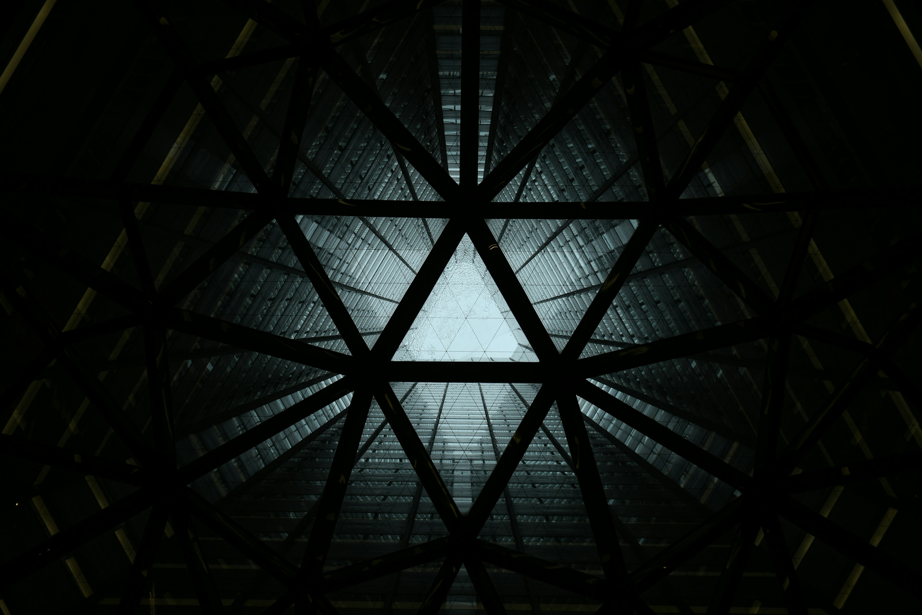 Hexagonal shape illuminated against a dark background