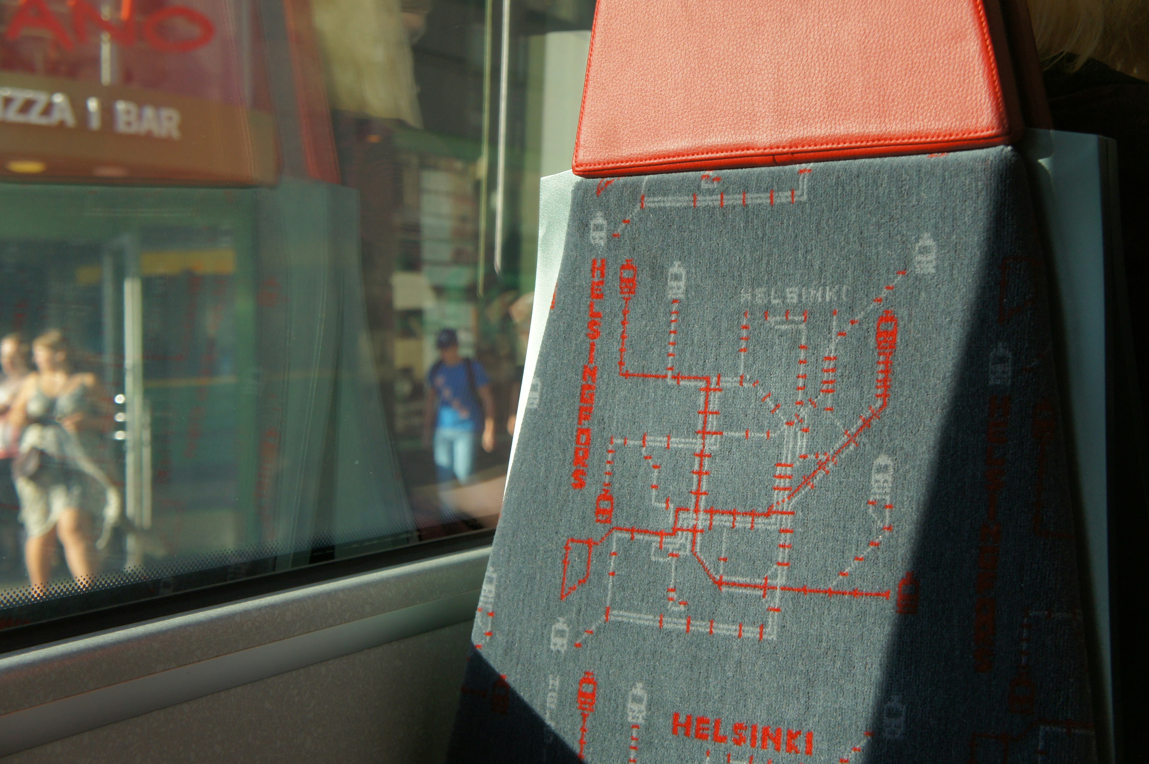 Bus seat with a map design and city background