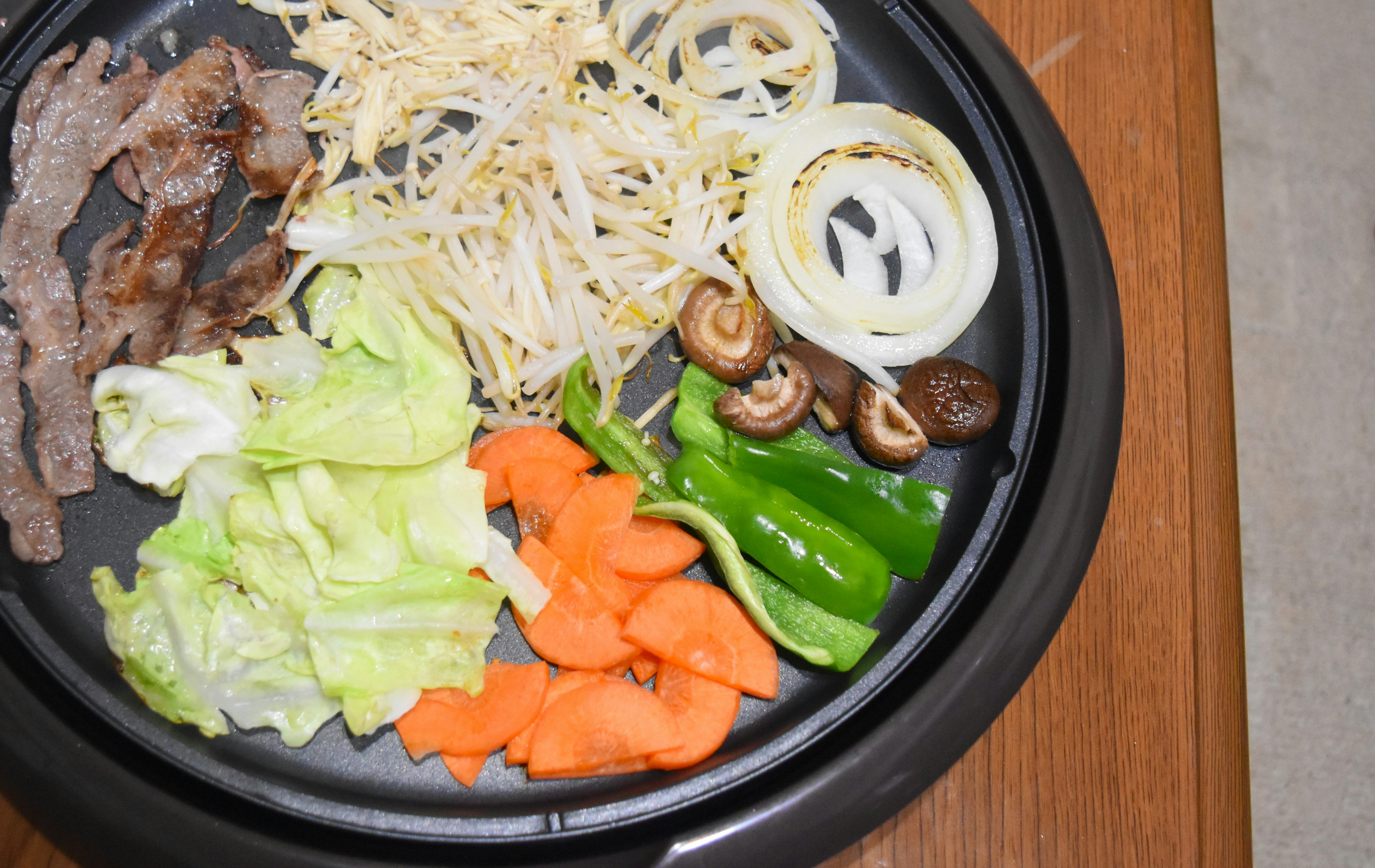 Platter of grilled meat and assorted vegetables