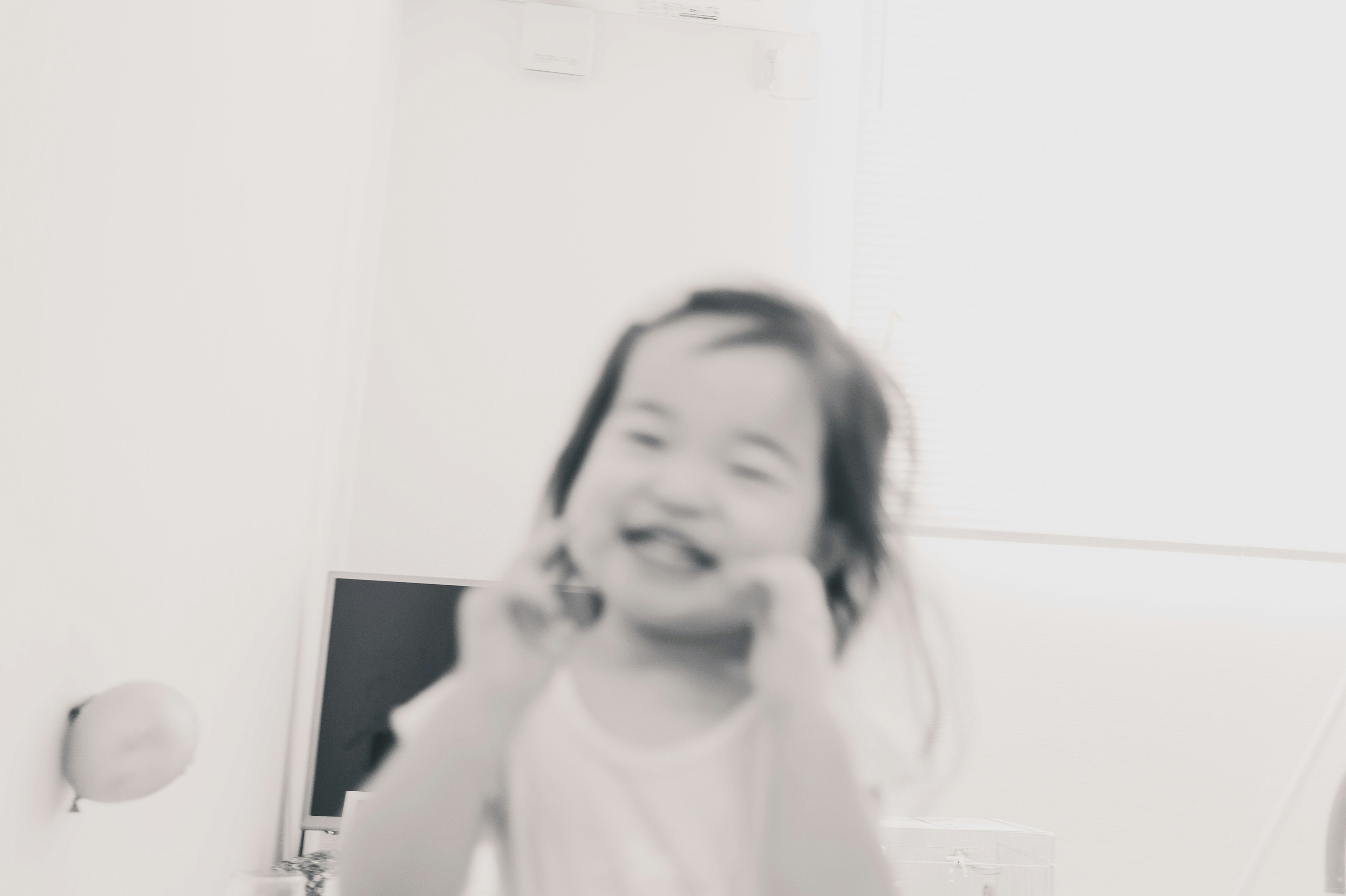 Smiling child playing in a bright room