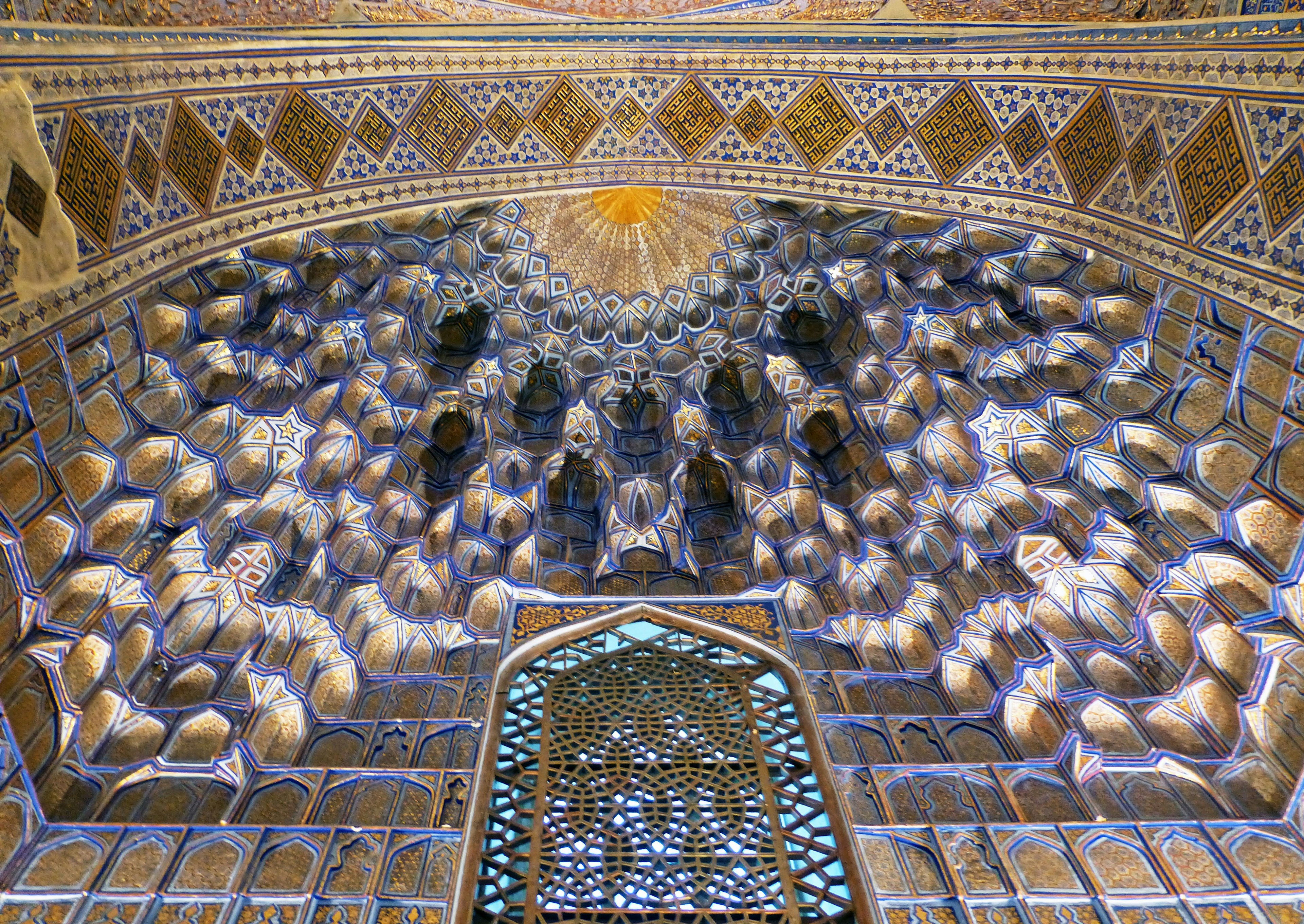 Intricate arch ceiling featuring geometric patterns and vibrant colors