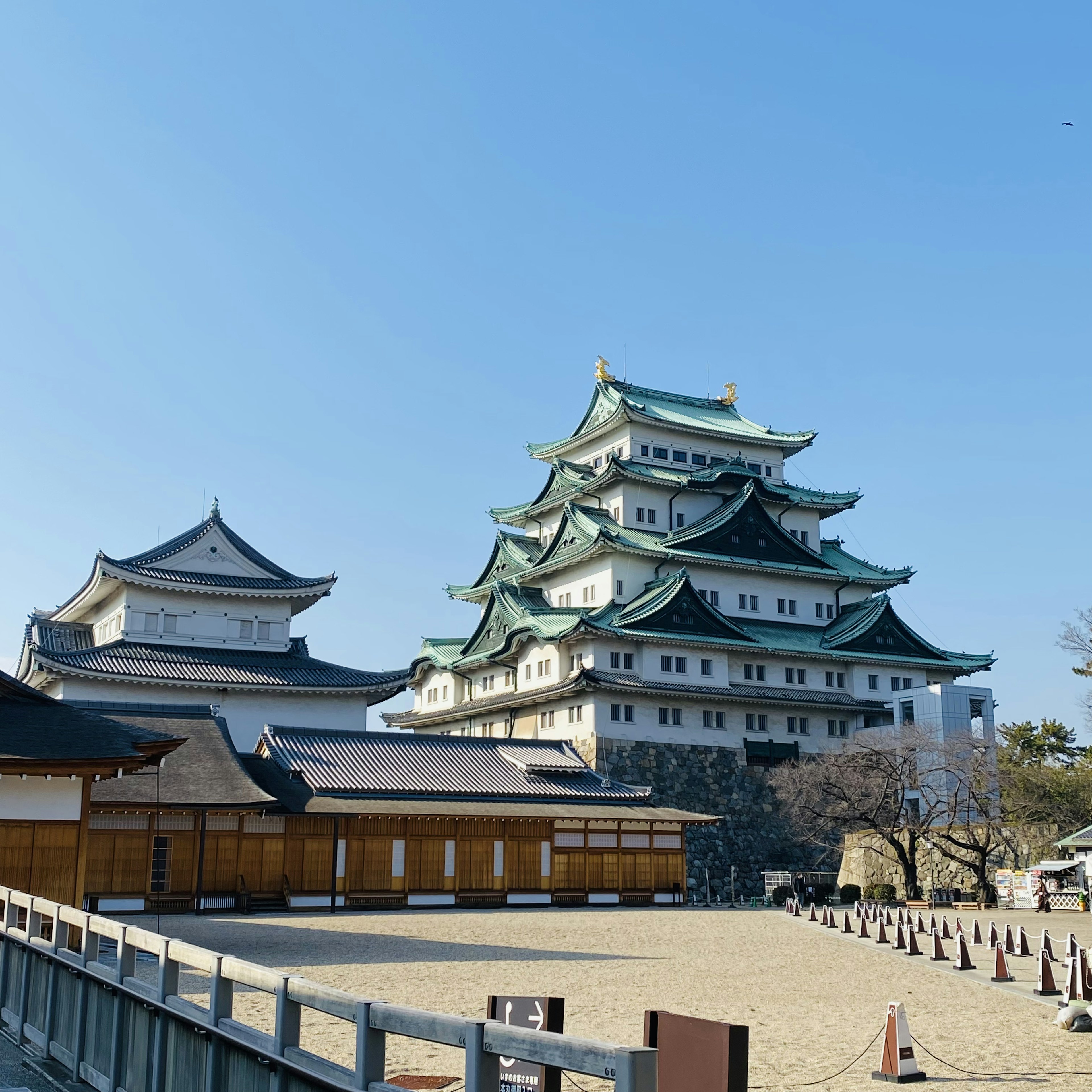 Nagoya Castle exterior showcasing traditional architecture under a clear blue sky