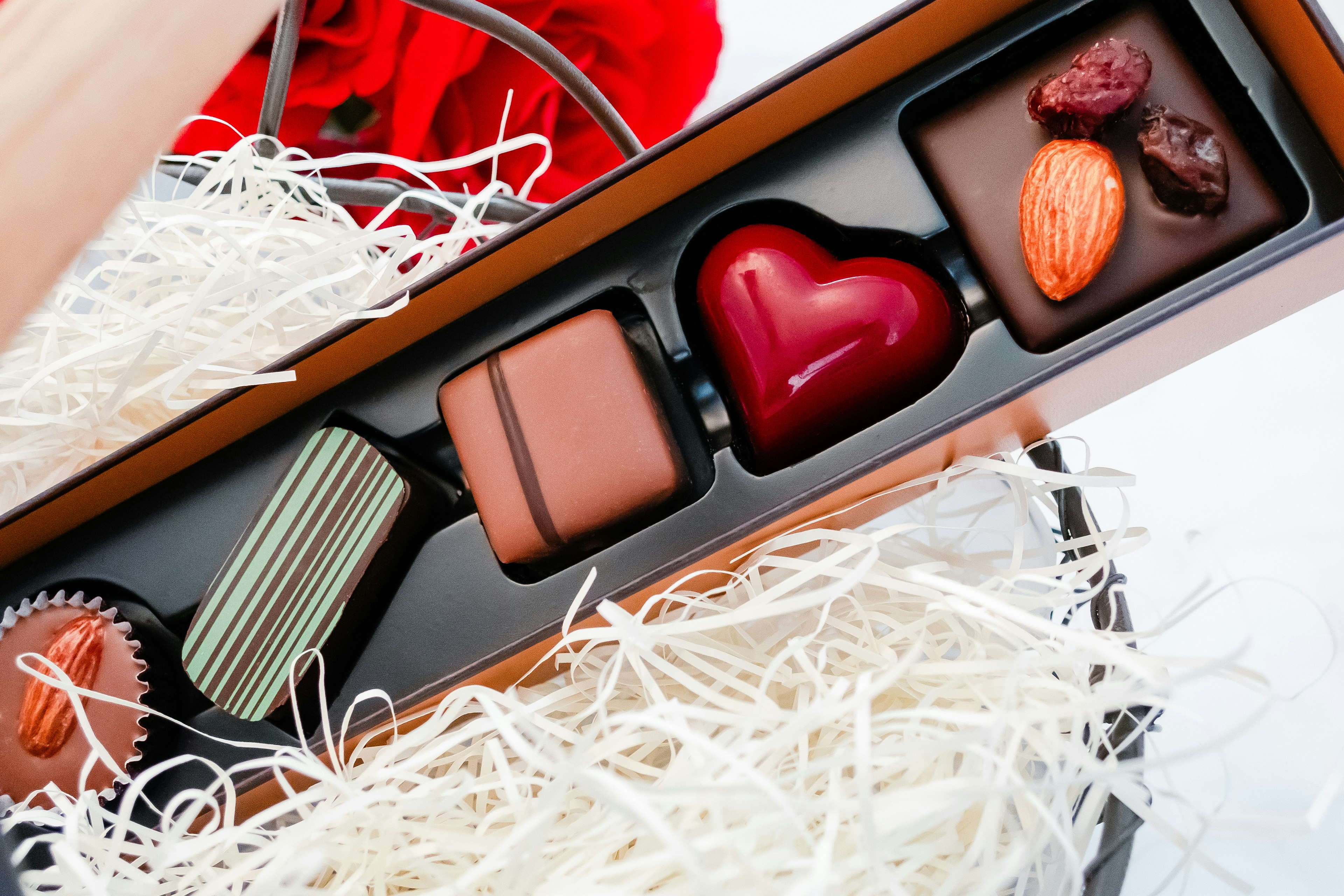 A beautiful assortment of chocolates in a wooden box