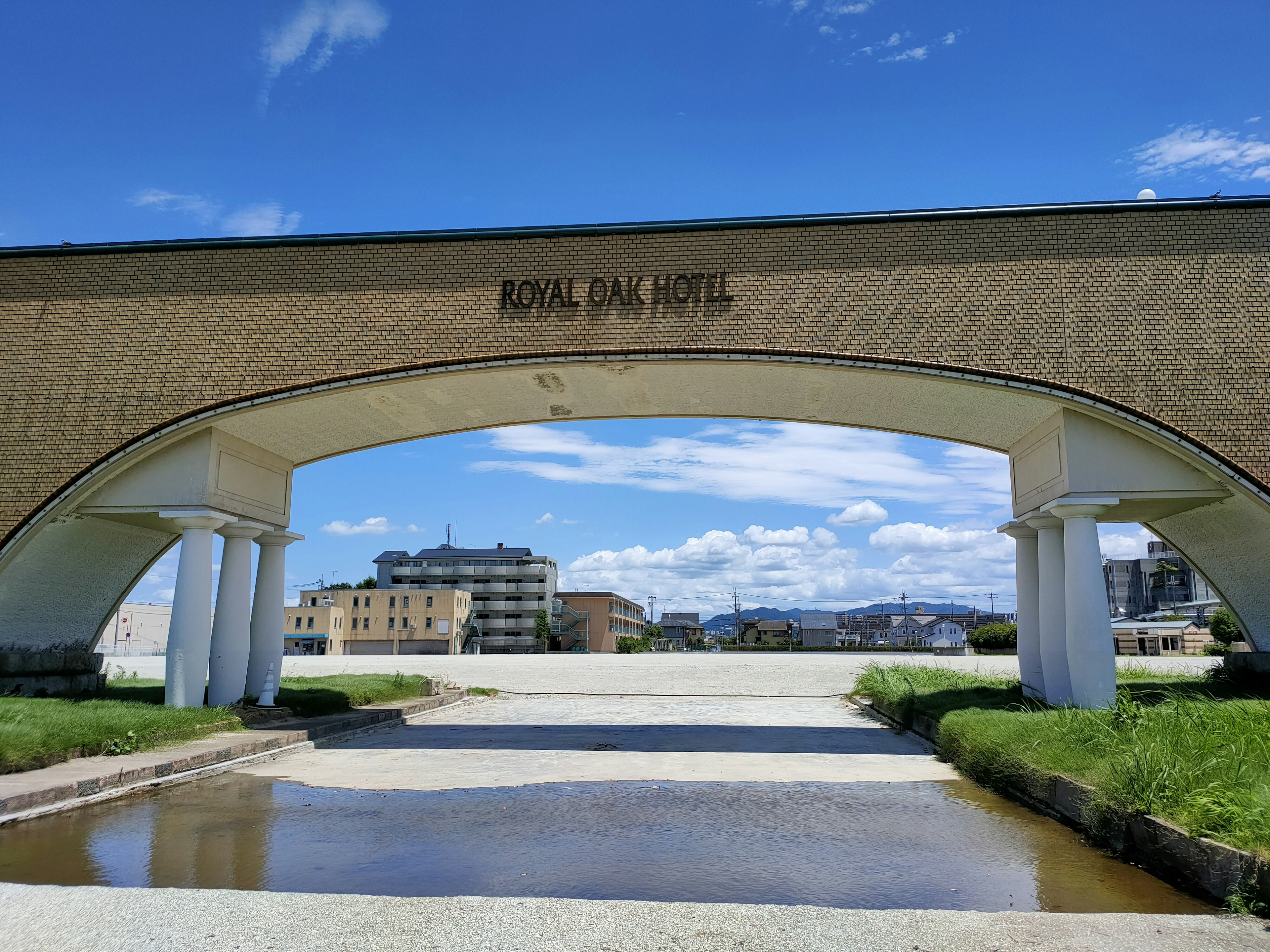 Archway of Royal Dan Hotel with blue sky