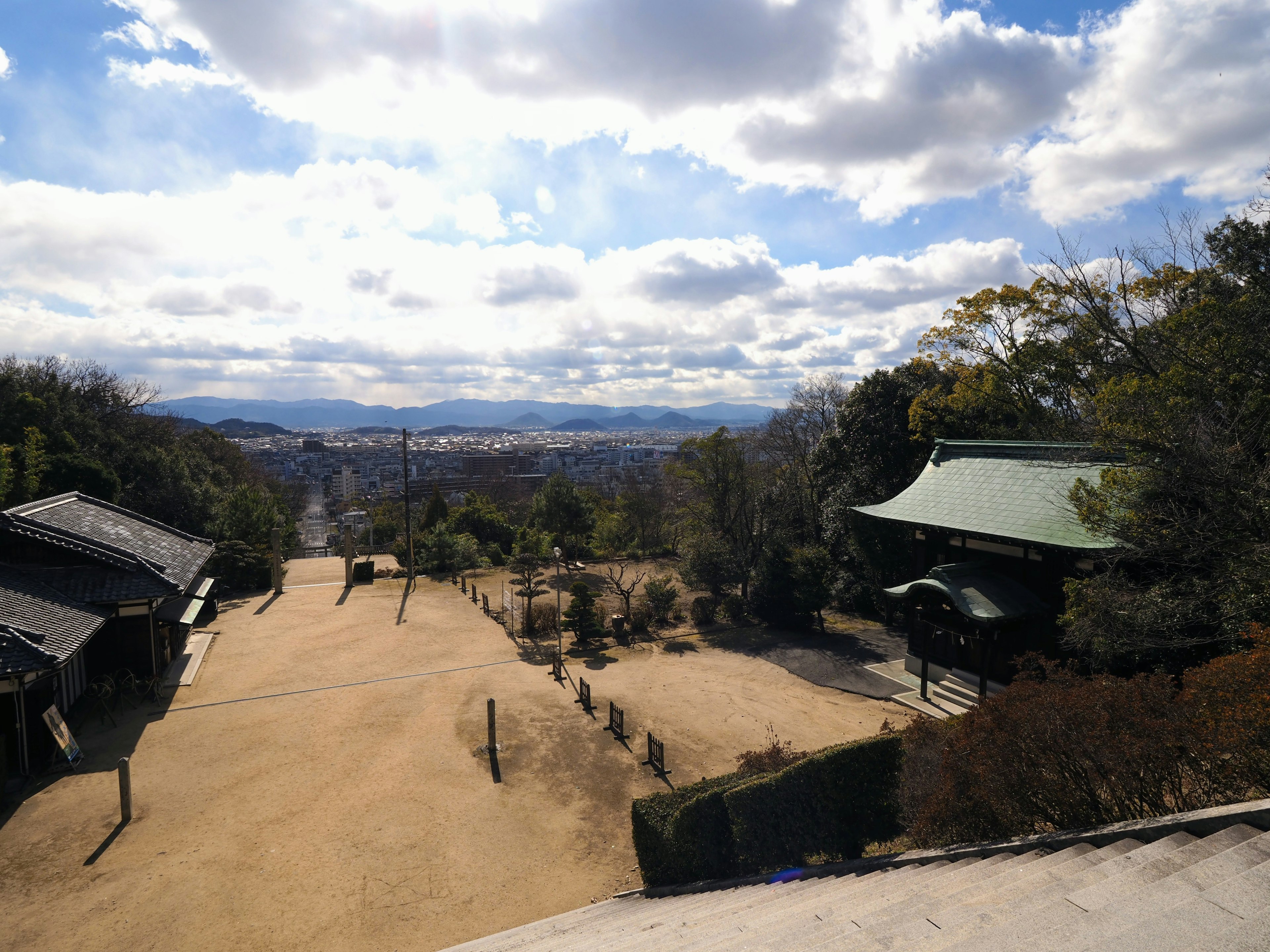 Scenic view of mountains and a temple roof