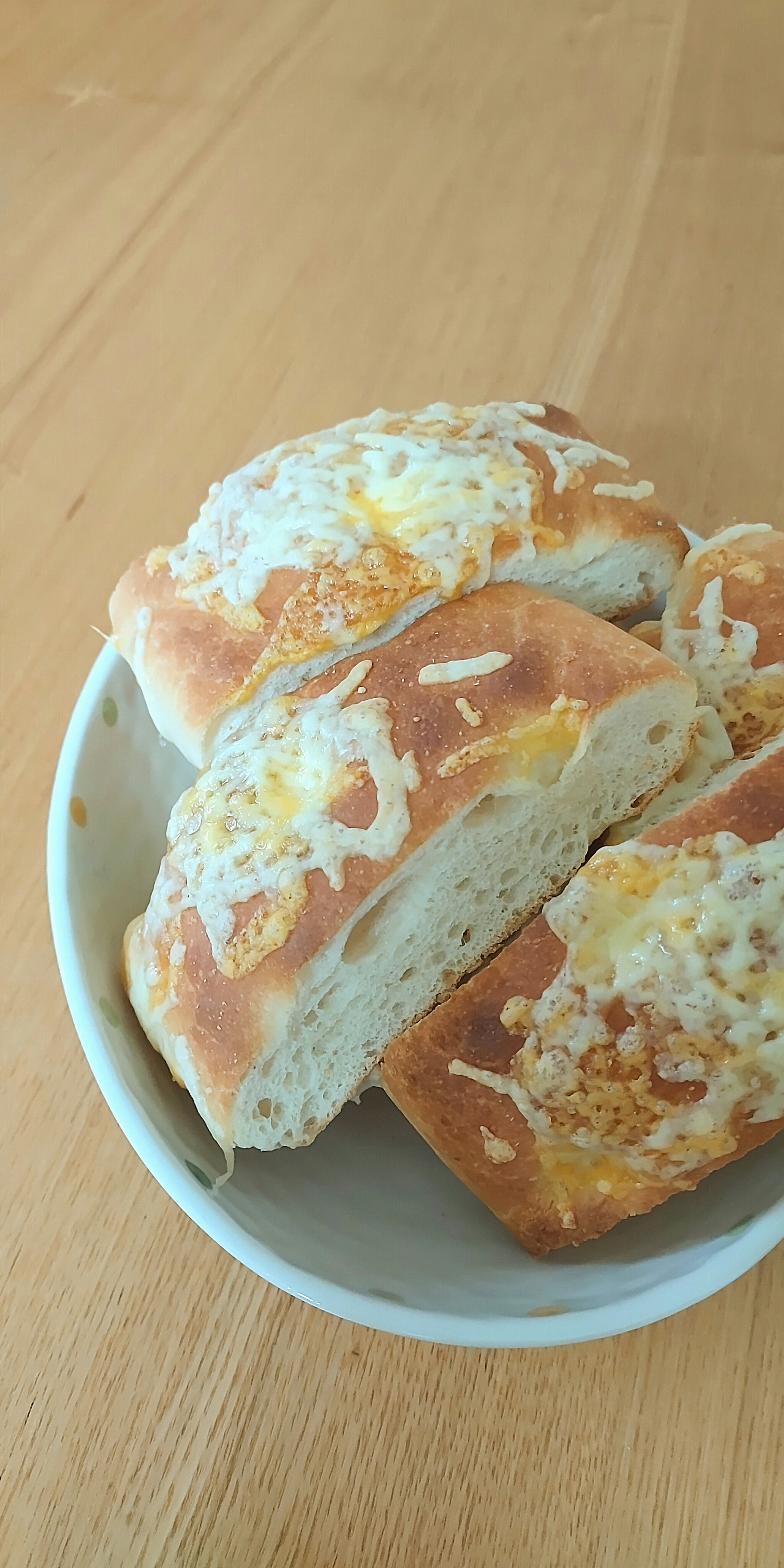 Freshly baked bread displayed in a bowl