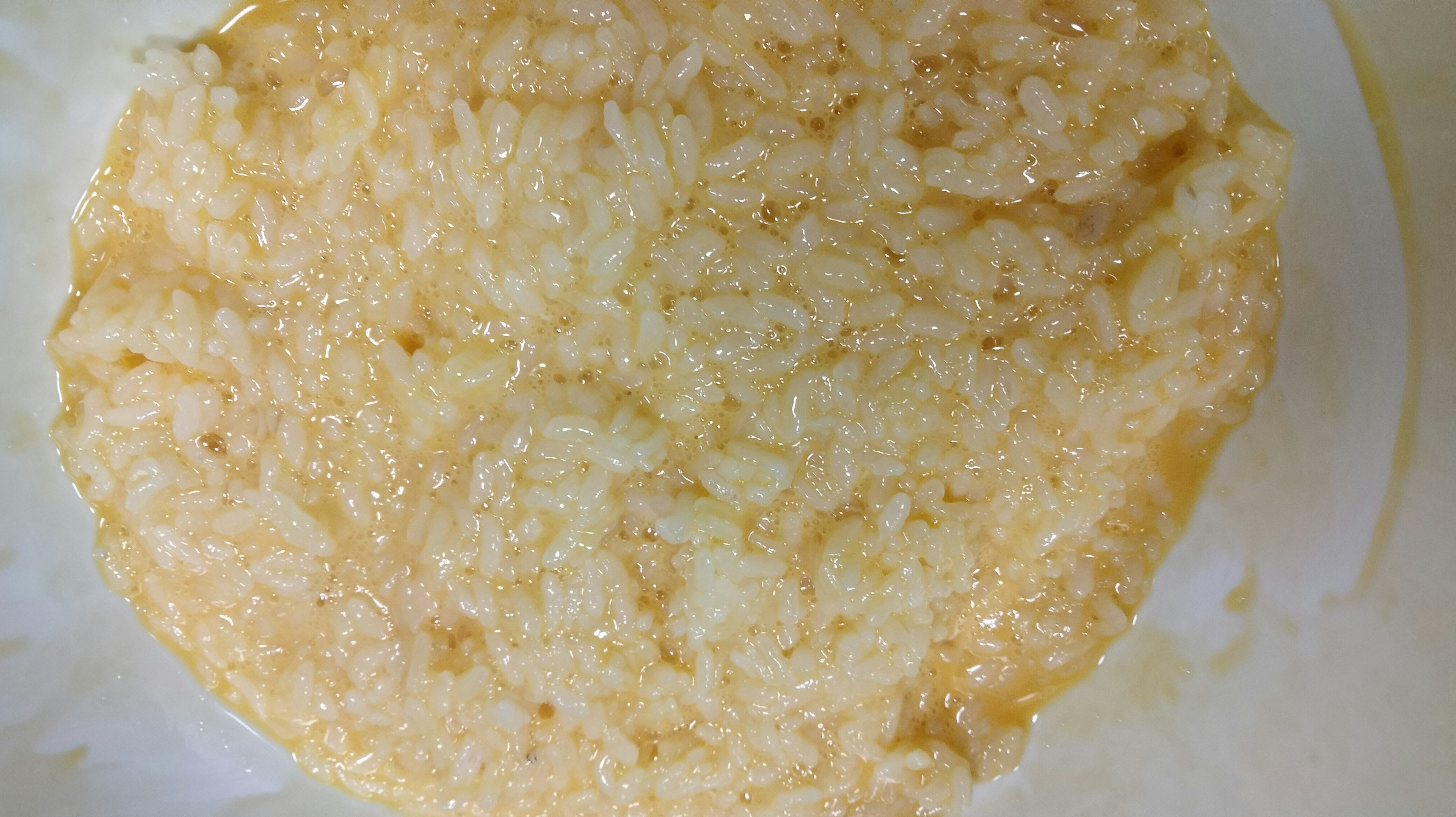 Close-up of a paste-like food ingredient with a light brown color