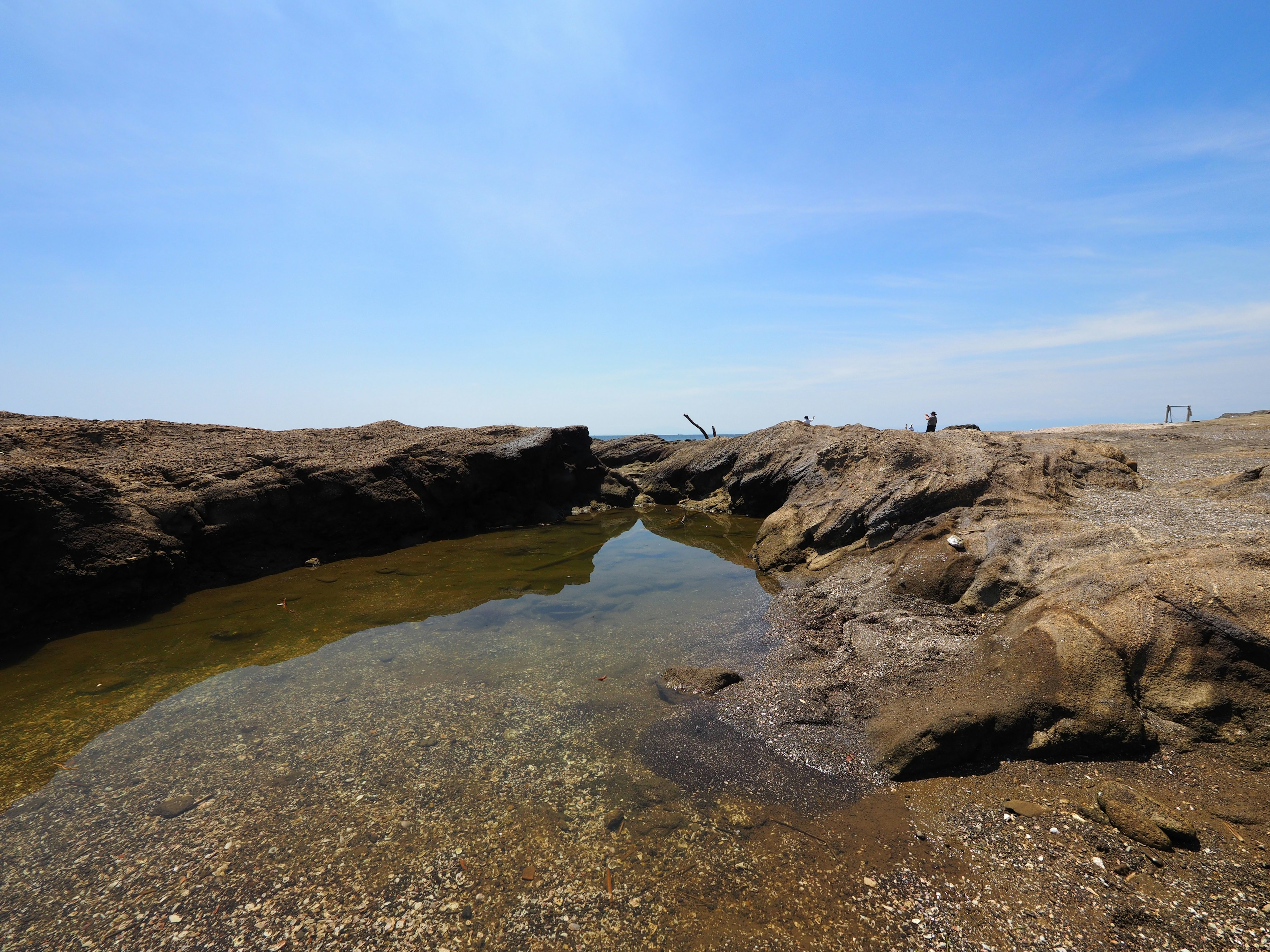 Coastal landscape with rocks and tide pool