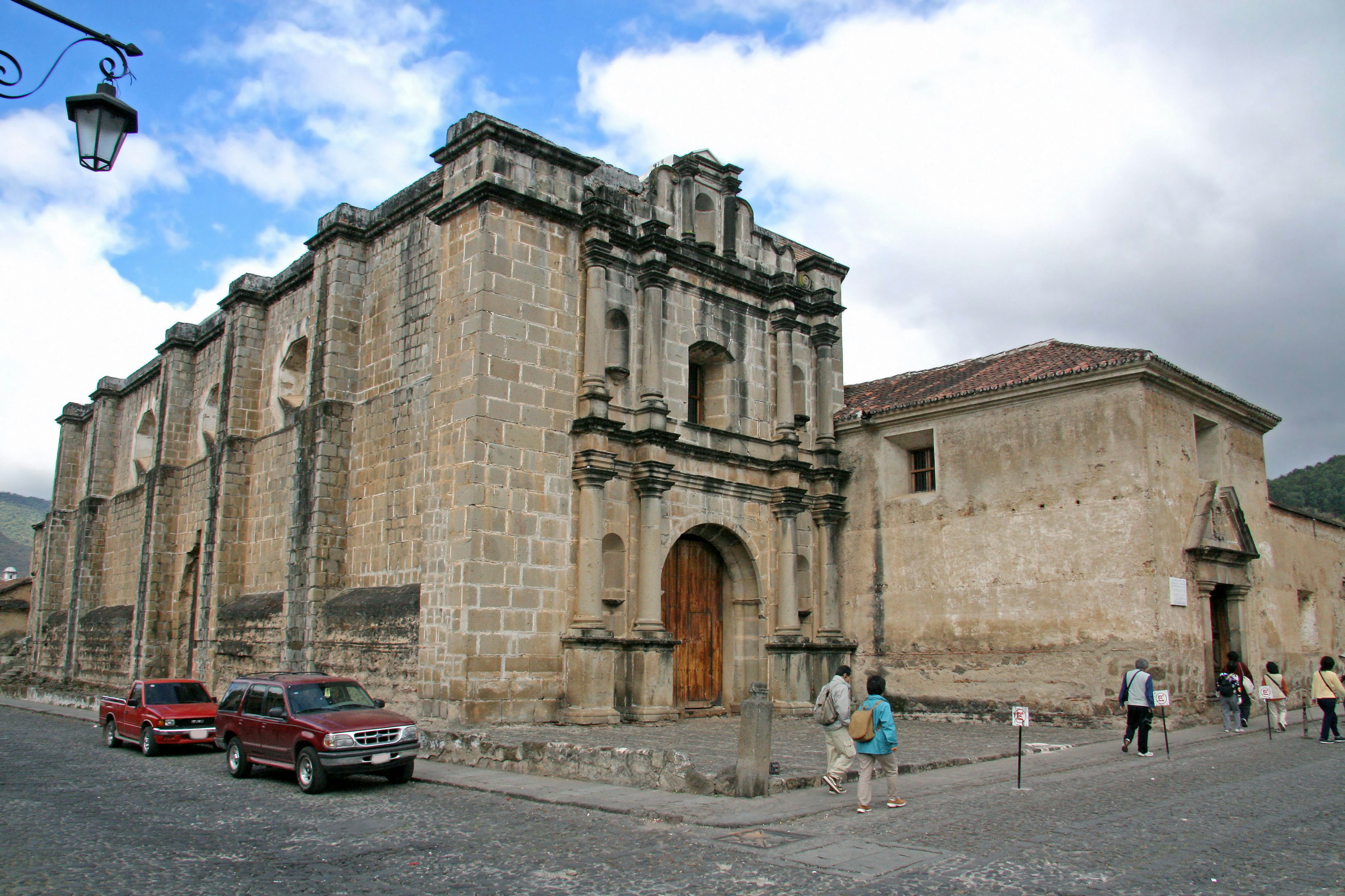 Classic stone church and historic buildings at a street corner