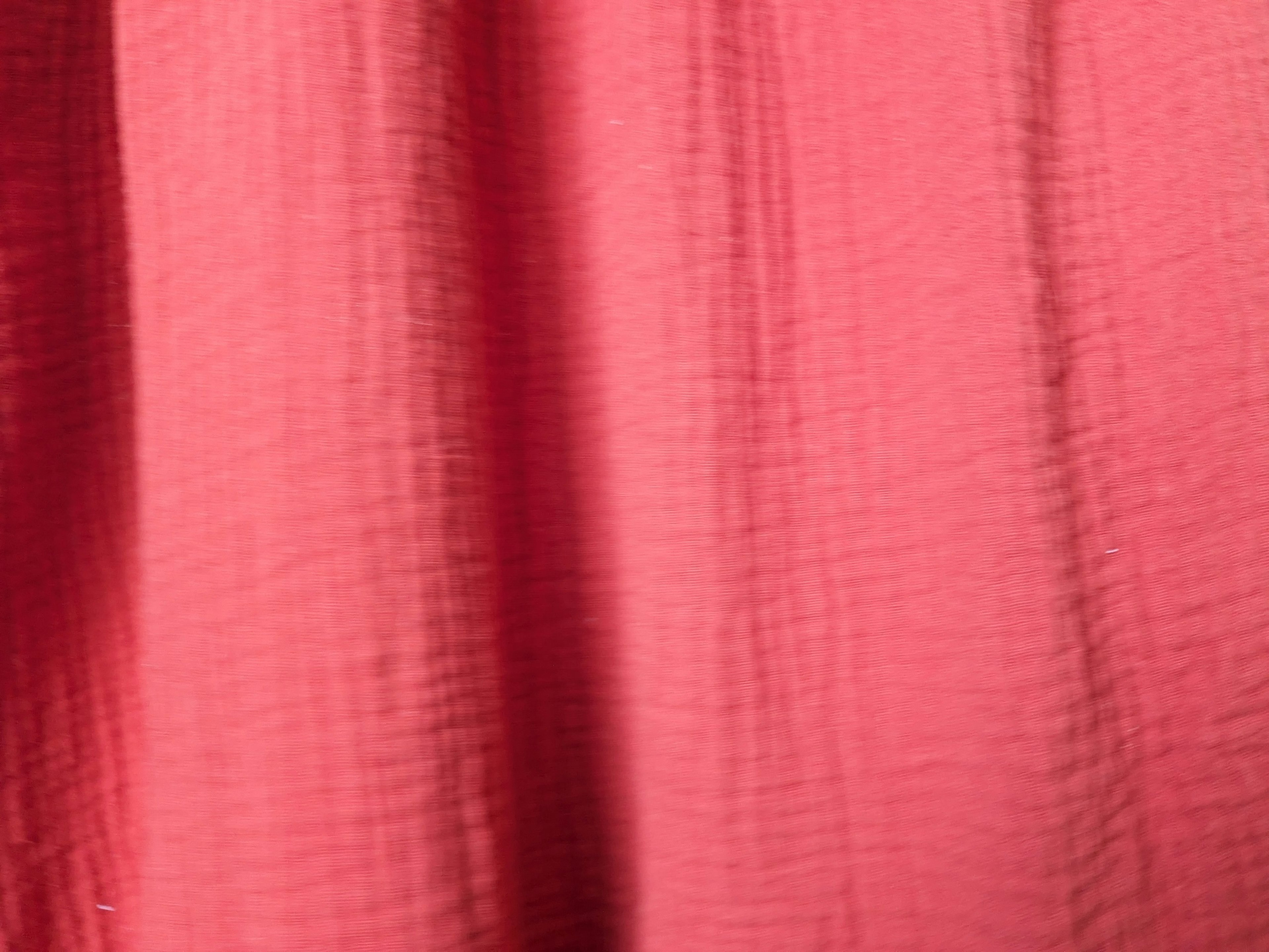 Close-up of vibrant pink fabric texture