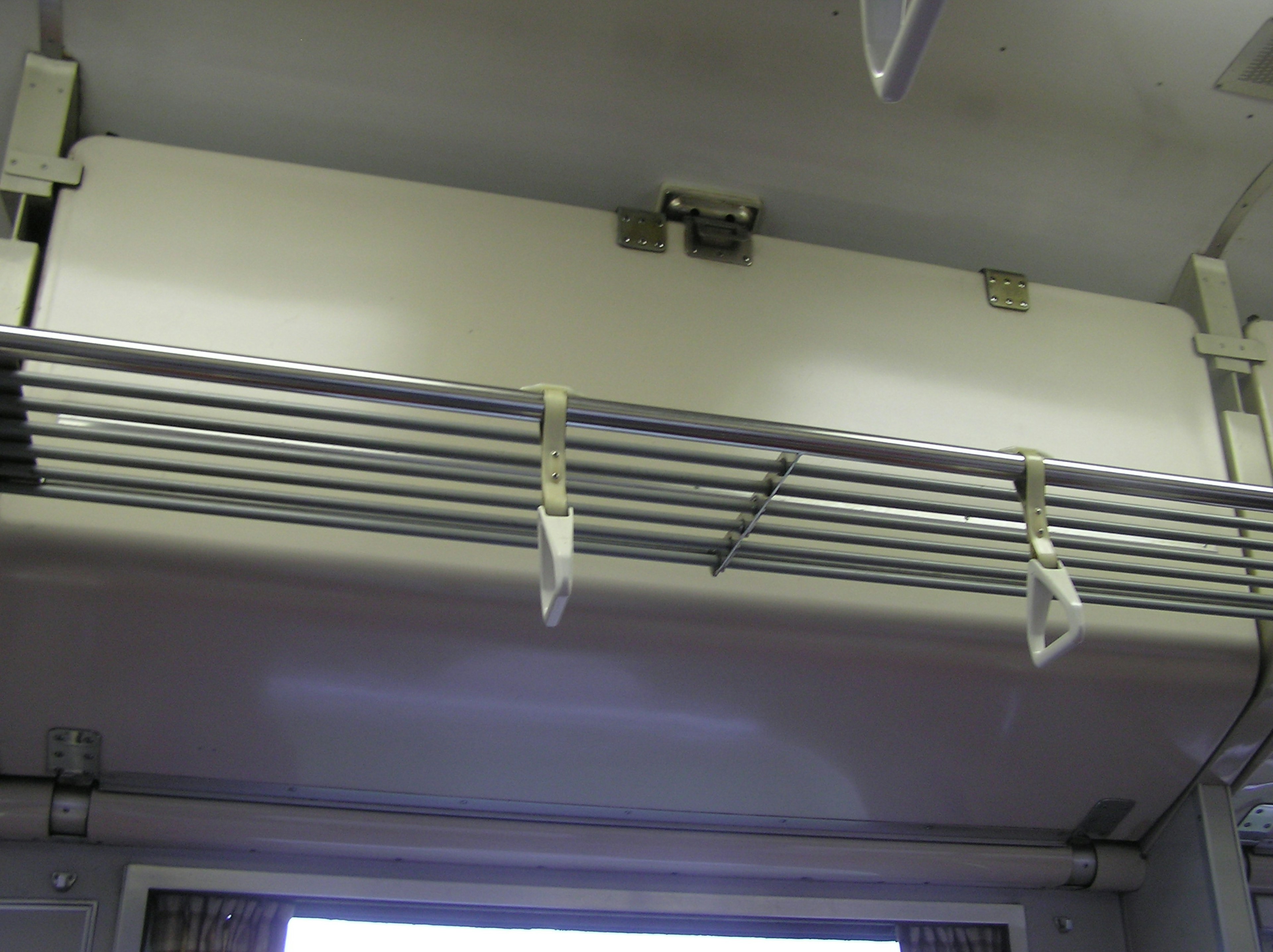 Upper structure of a luggage rack inside a train