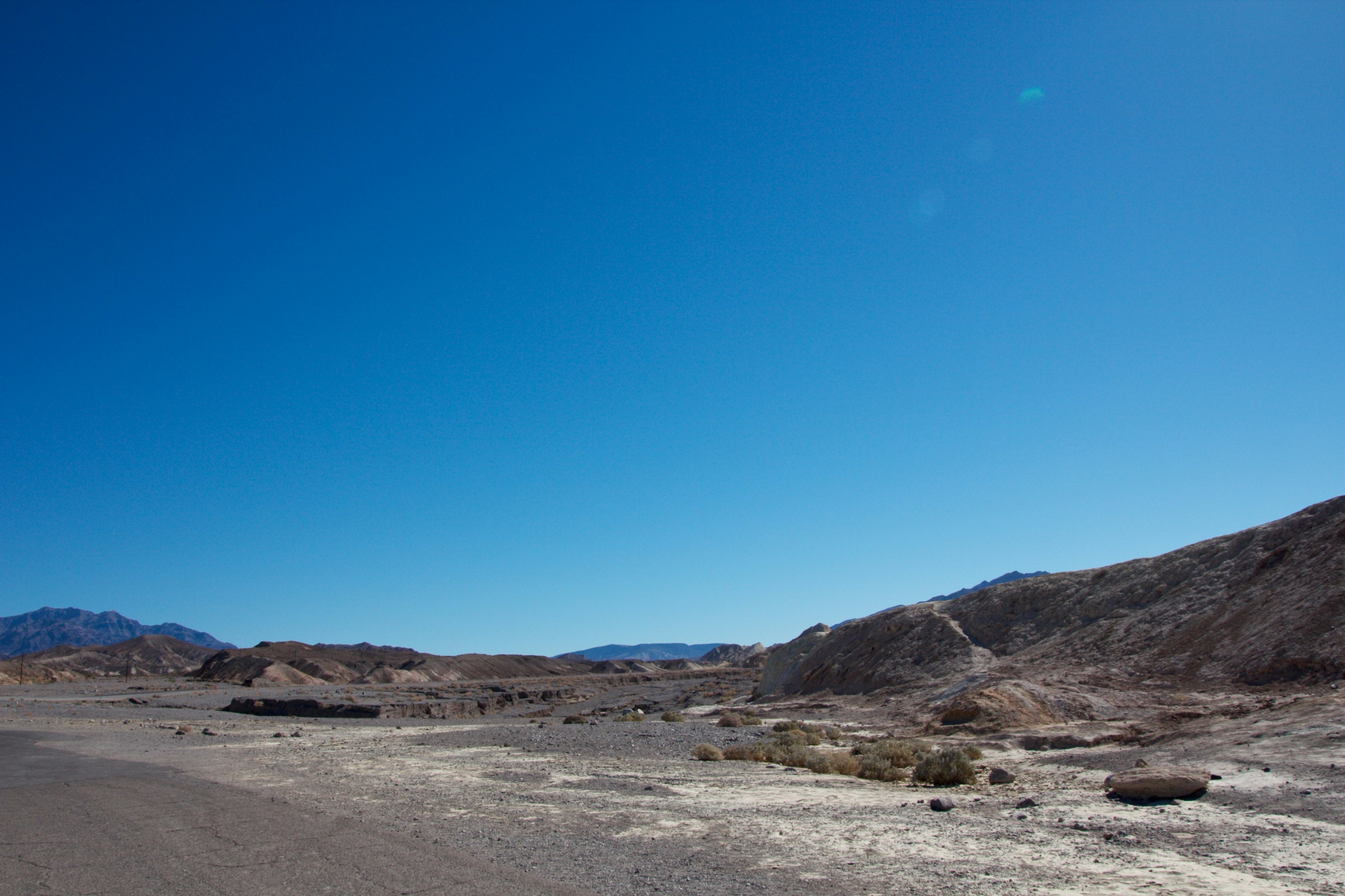 Landscape featuring a clear blue sky and dry terrain