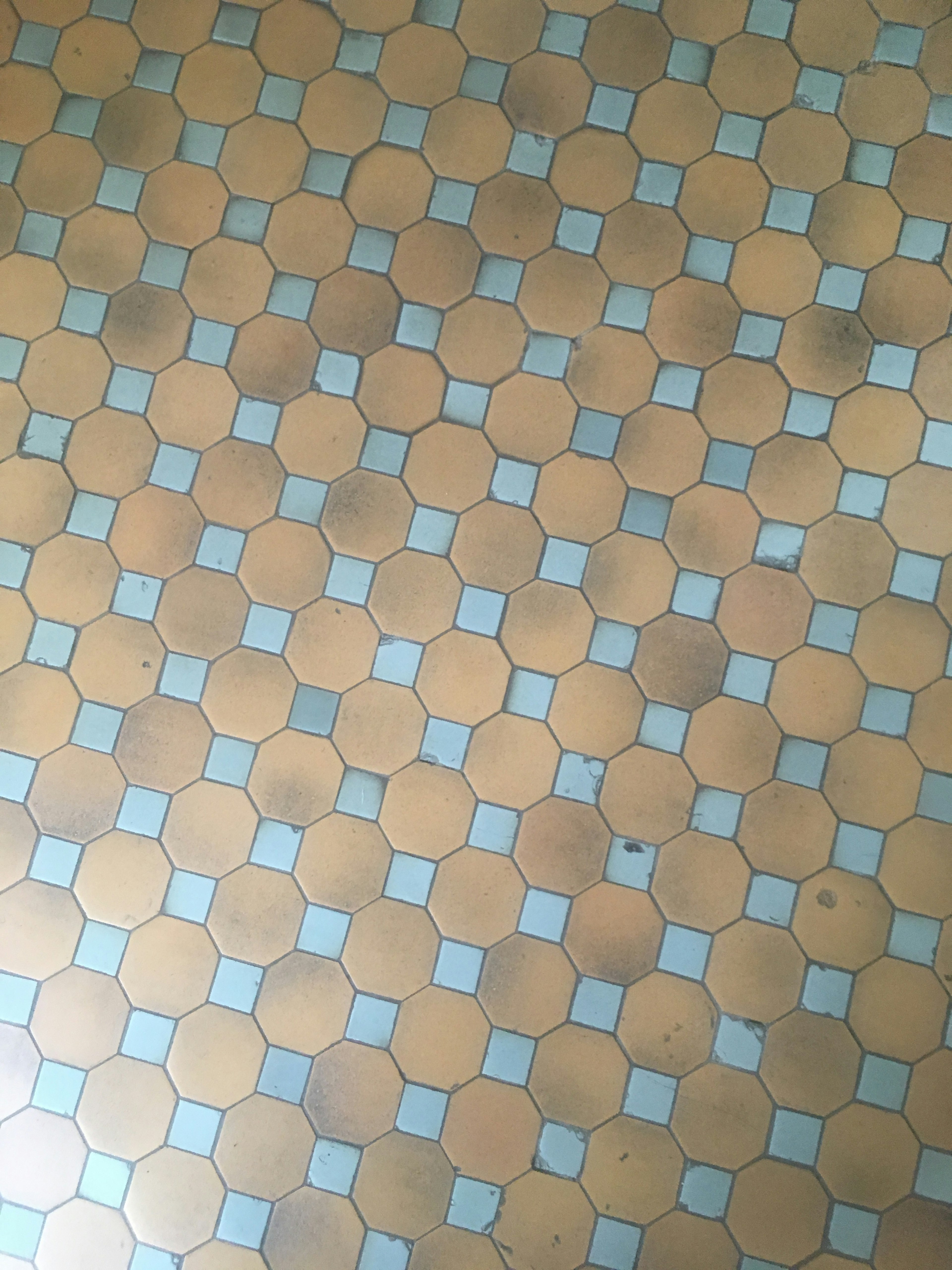 Floor design made of hexagonal and square tiles