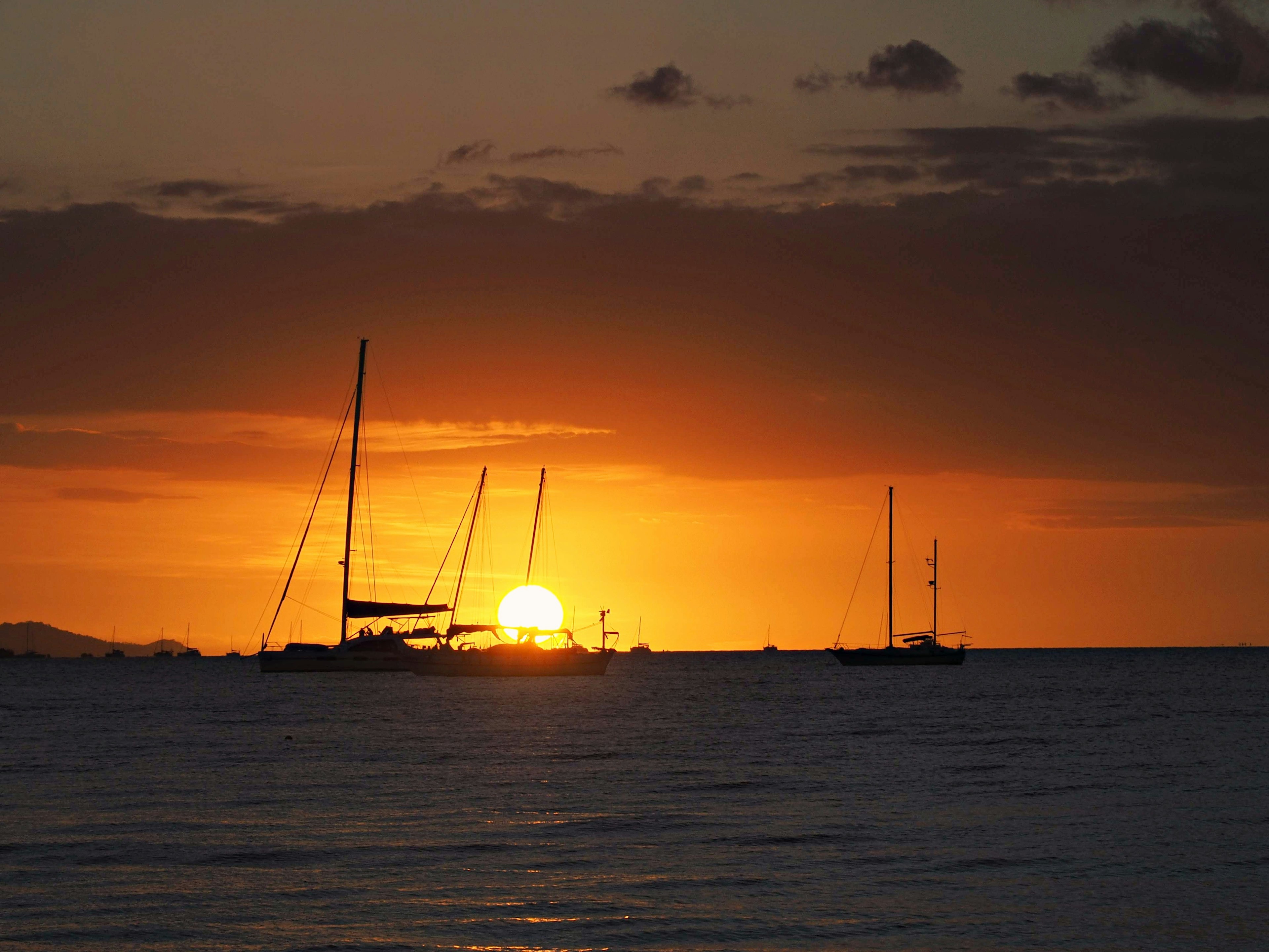 Silhouette of yachts on the sea at sunset