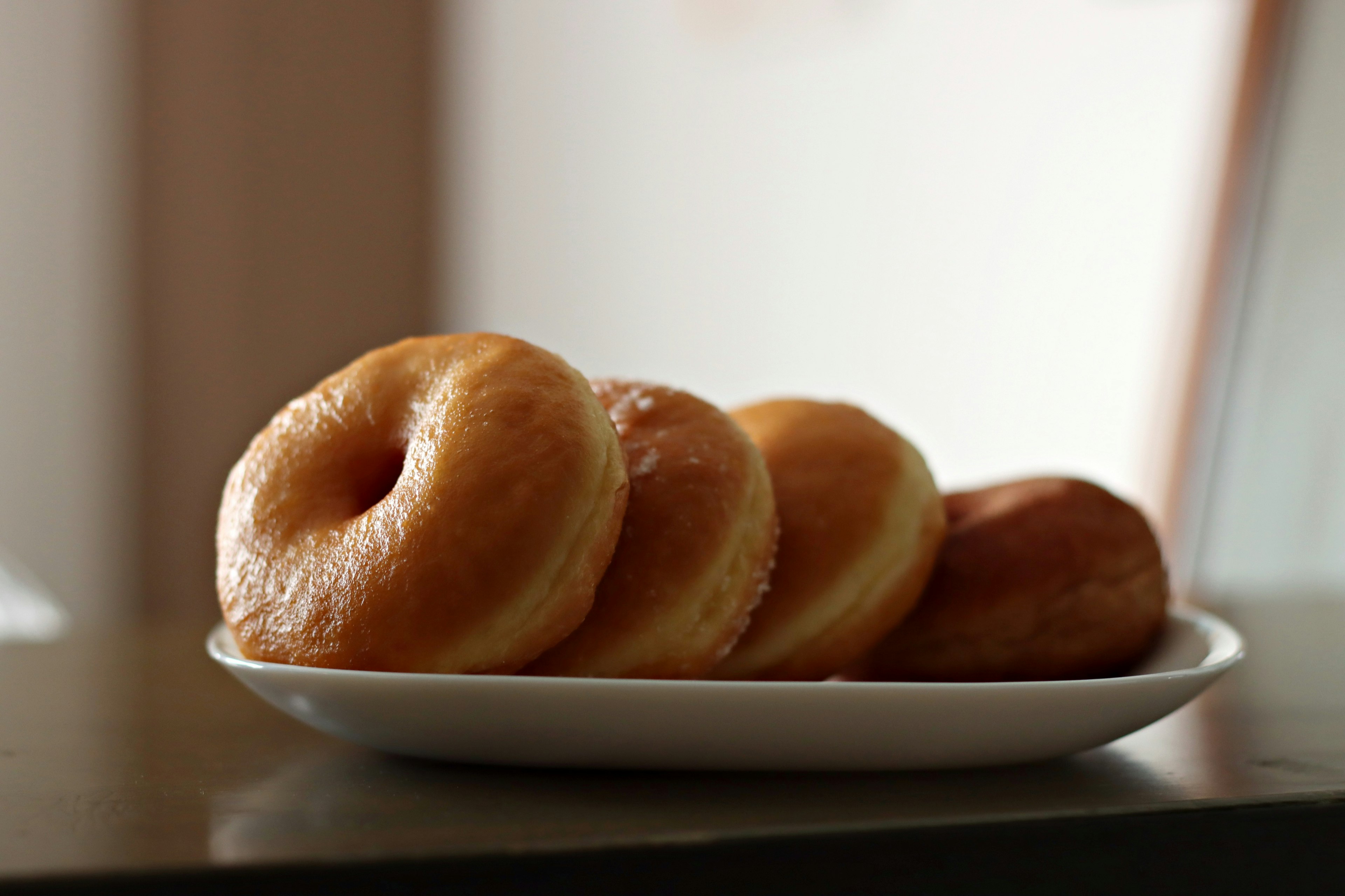 Delicious donuts arranged on a plate