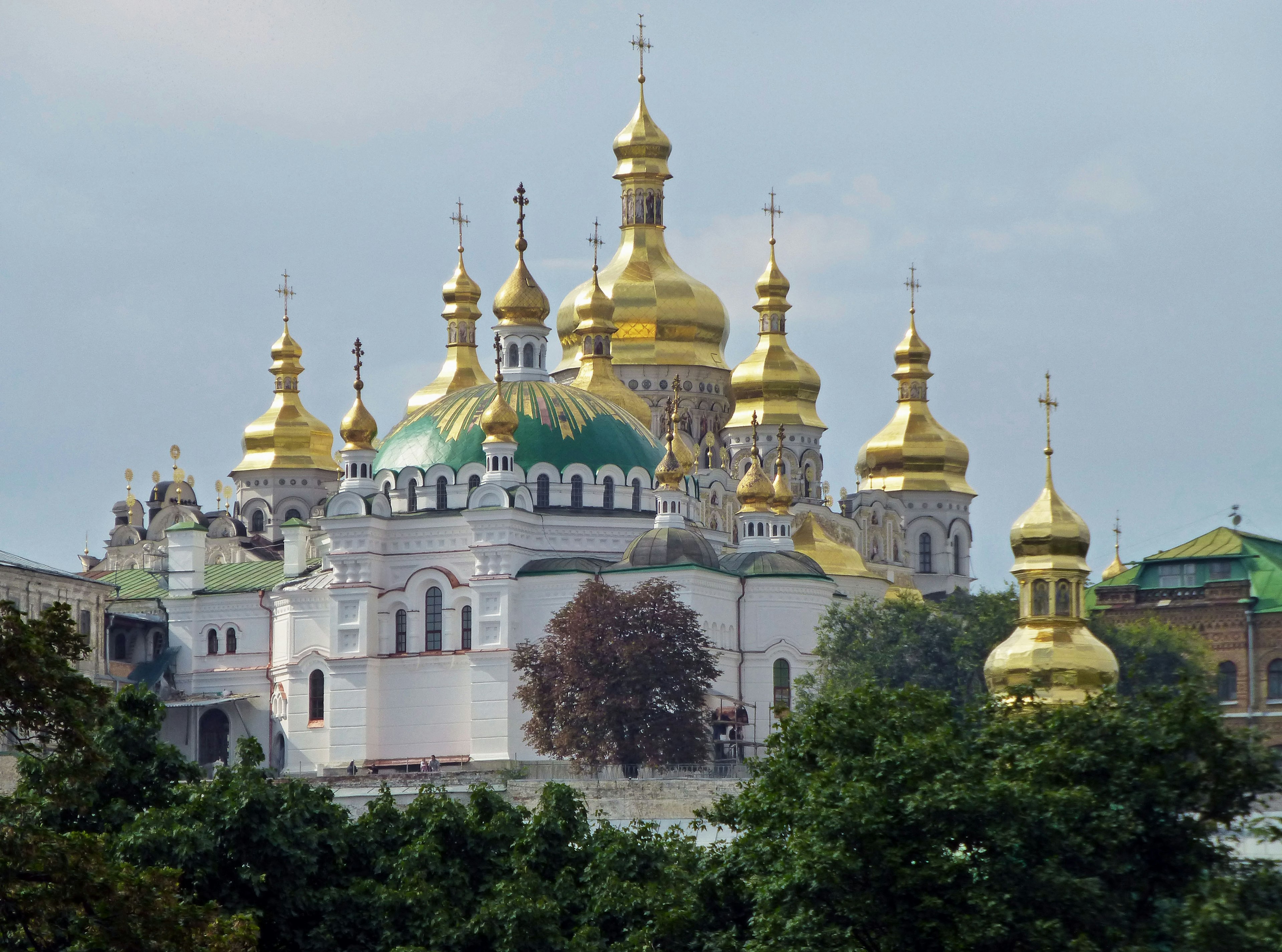 Scenic view of a church building with beautiful golden domes