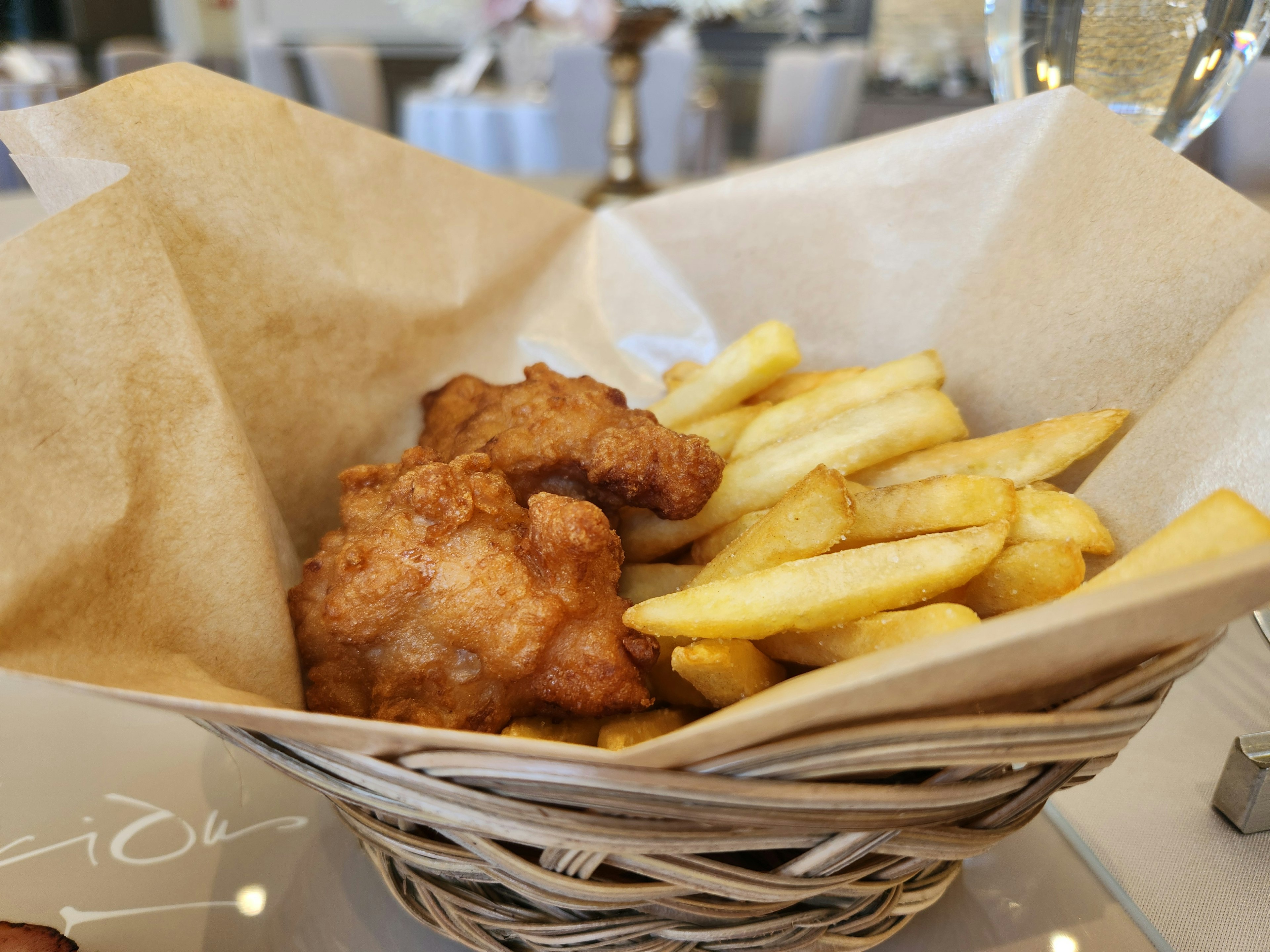 Basket of fried chicken and French fries