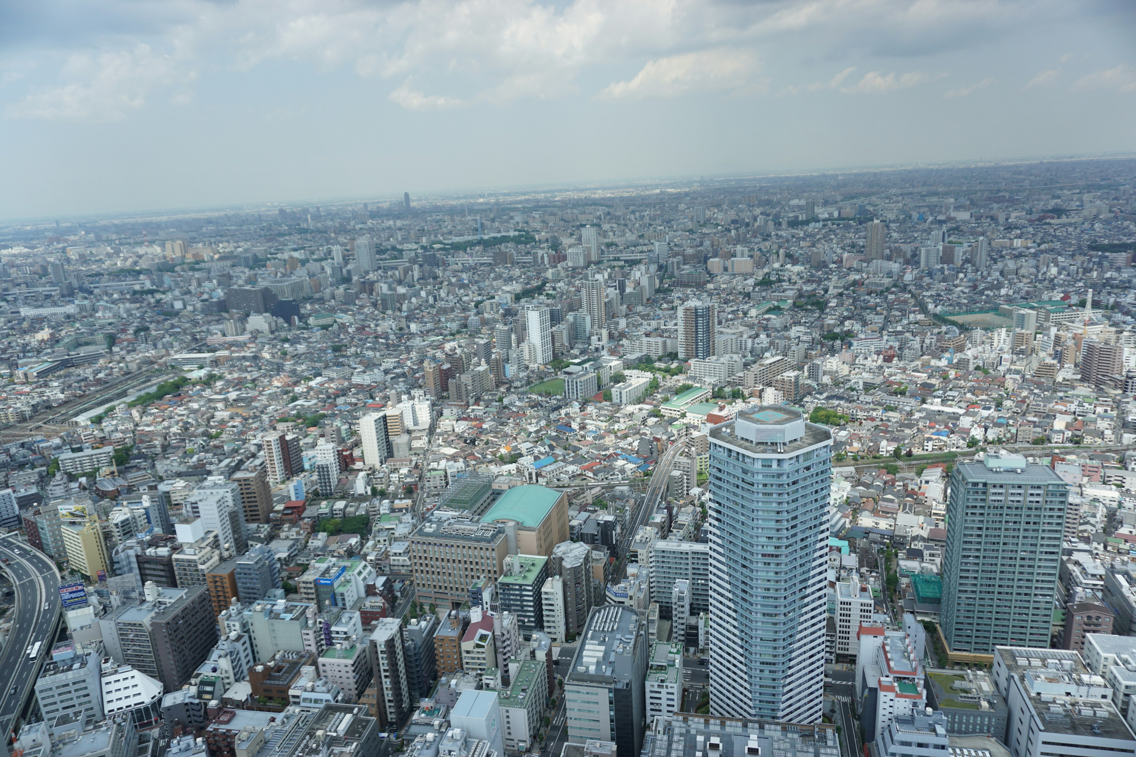 Panoramic view of Tokyo's skyline featuring high-rise buildings