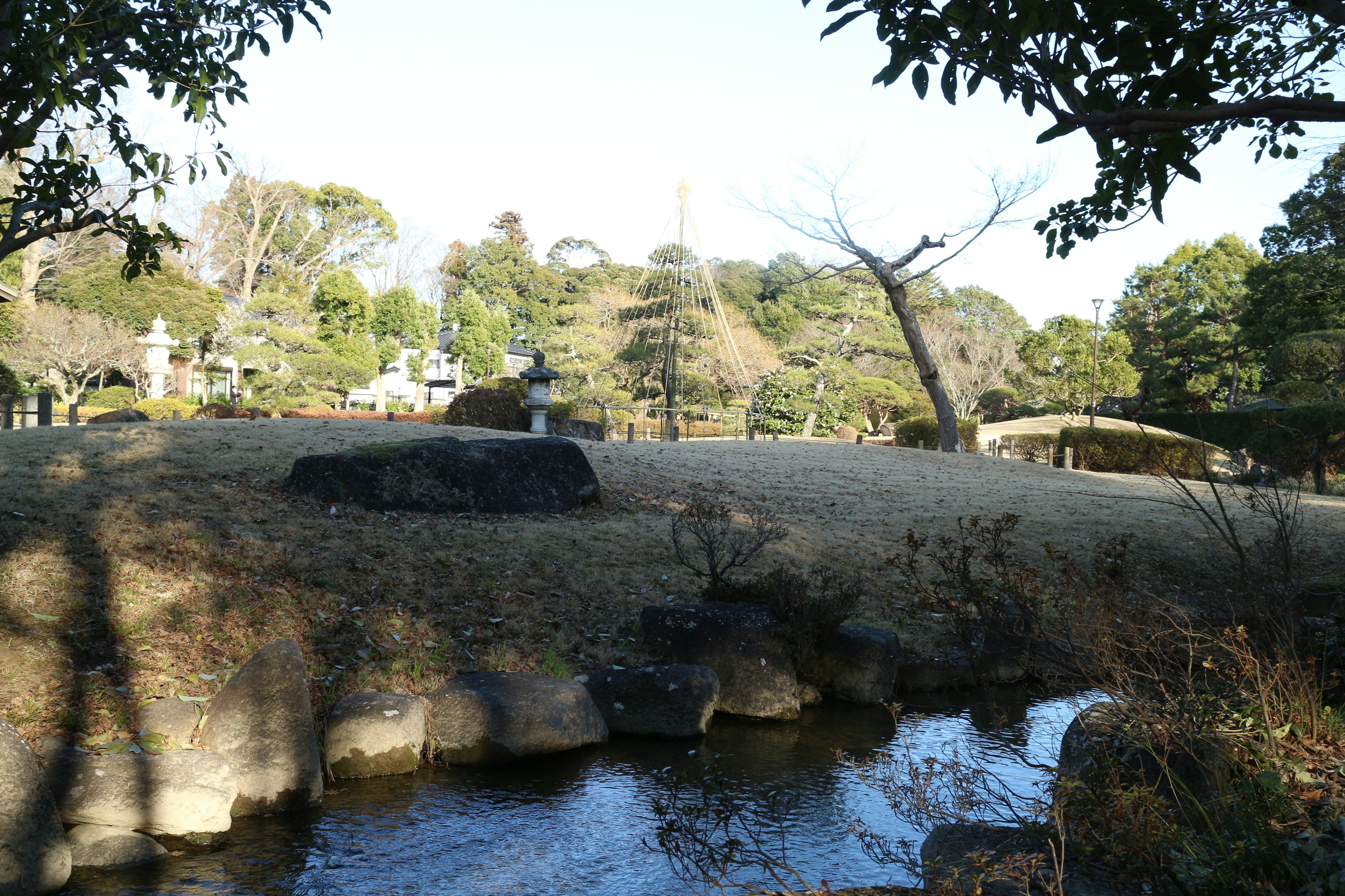 Scenic view of a cemetery and stream in a quiet park