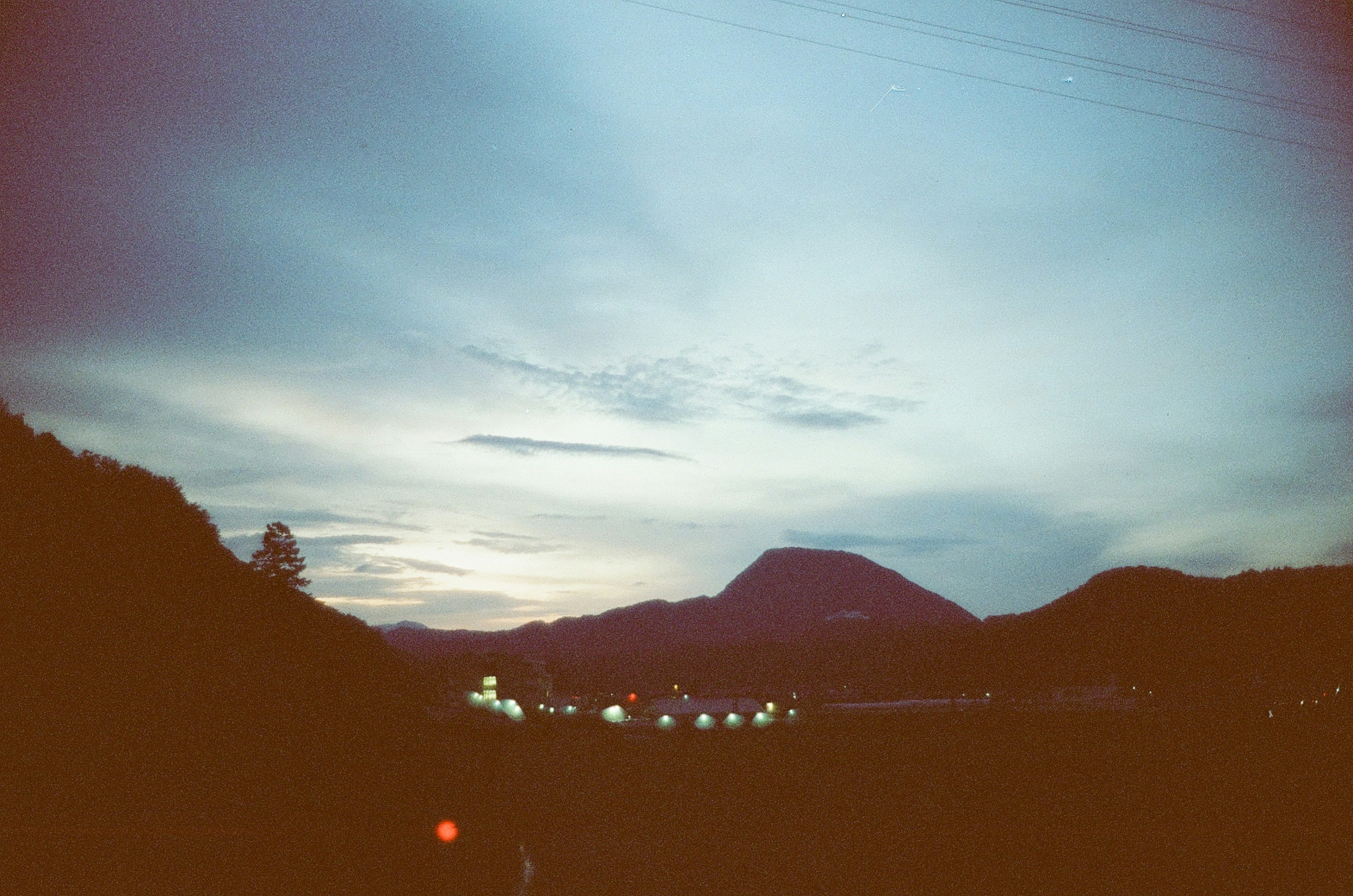 Scenic view of a sunset sky with mountain silhouettes