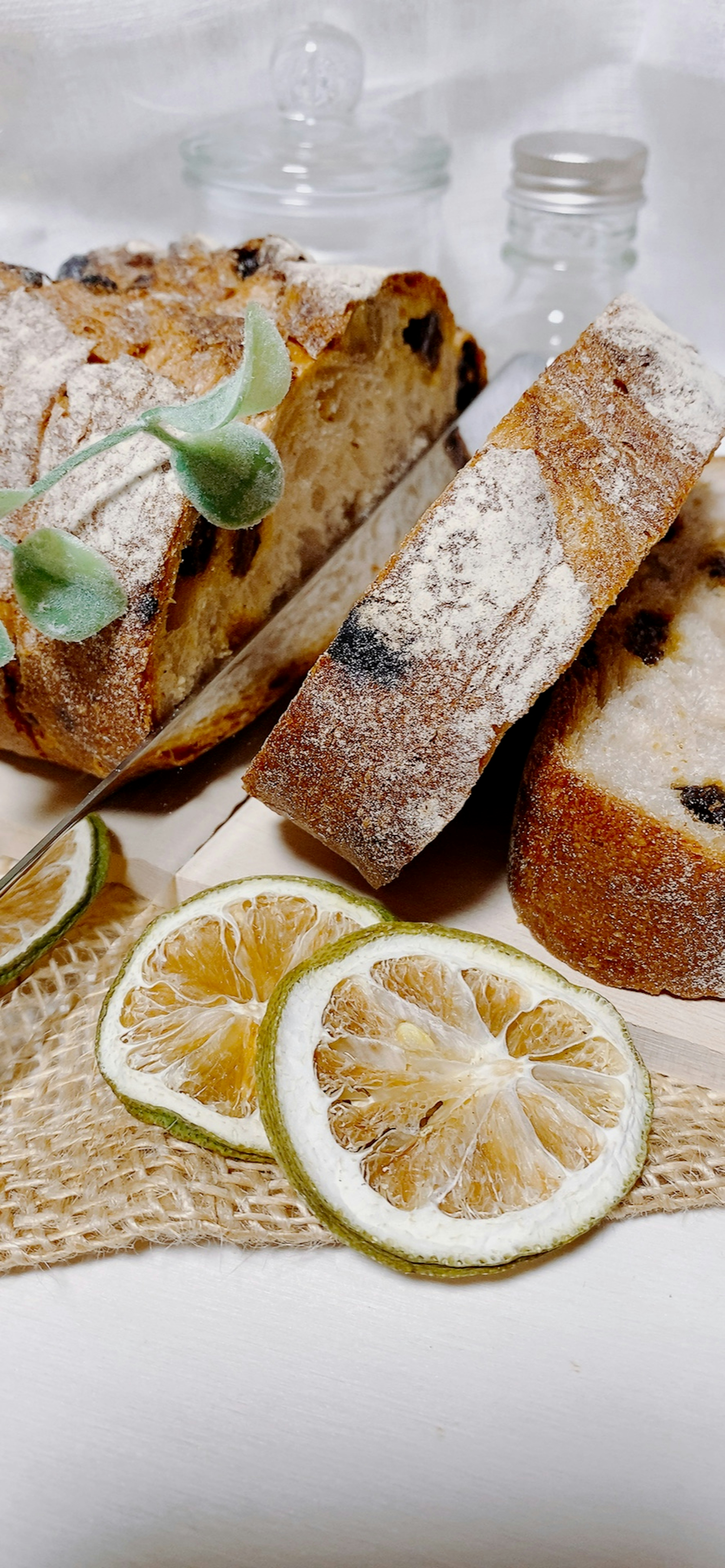 Fresh bread and lemon slices arranged beautifully