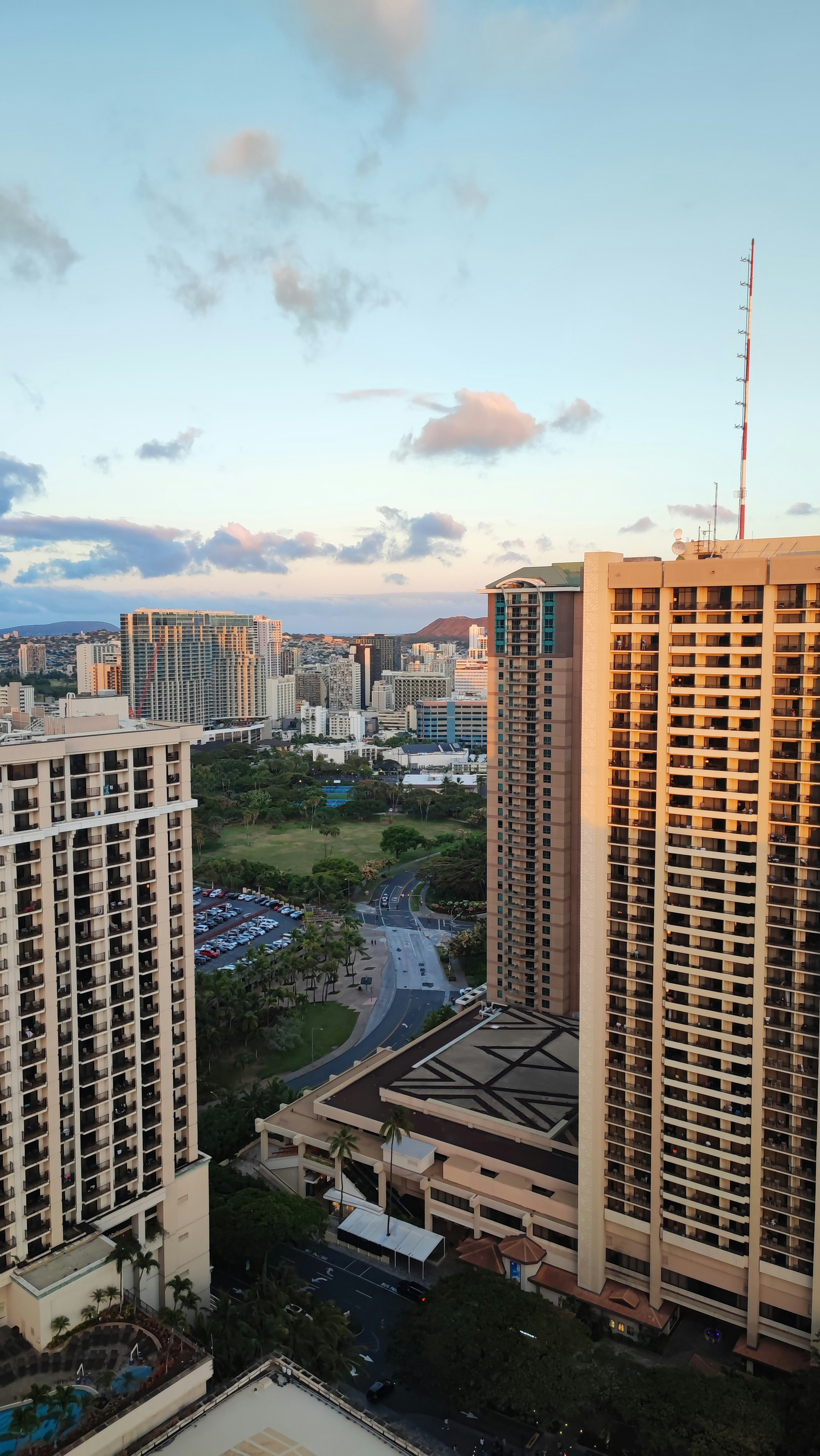 Cityscape featuring tall buildings and a blue sky