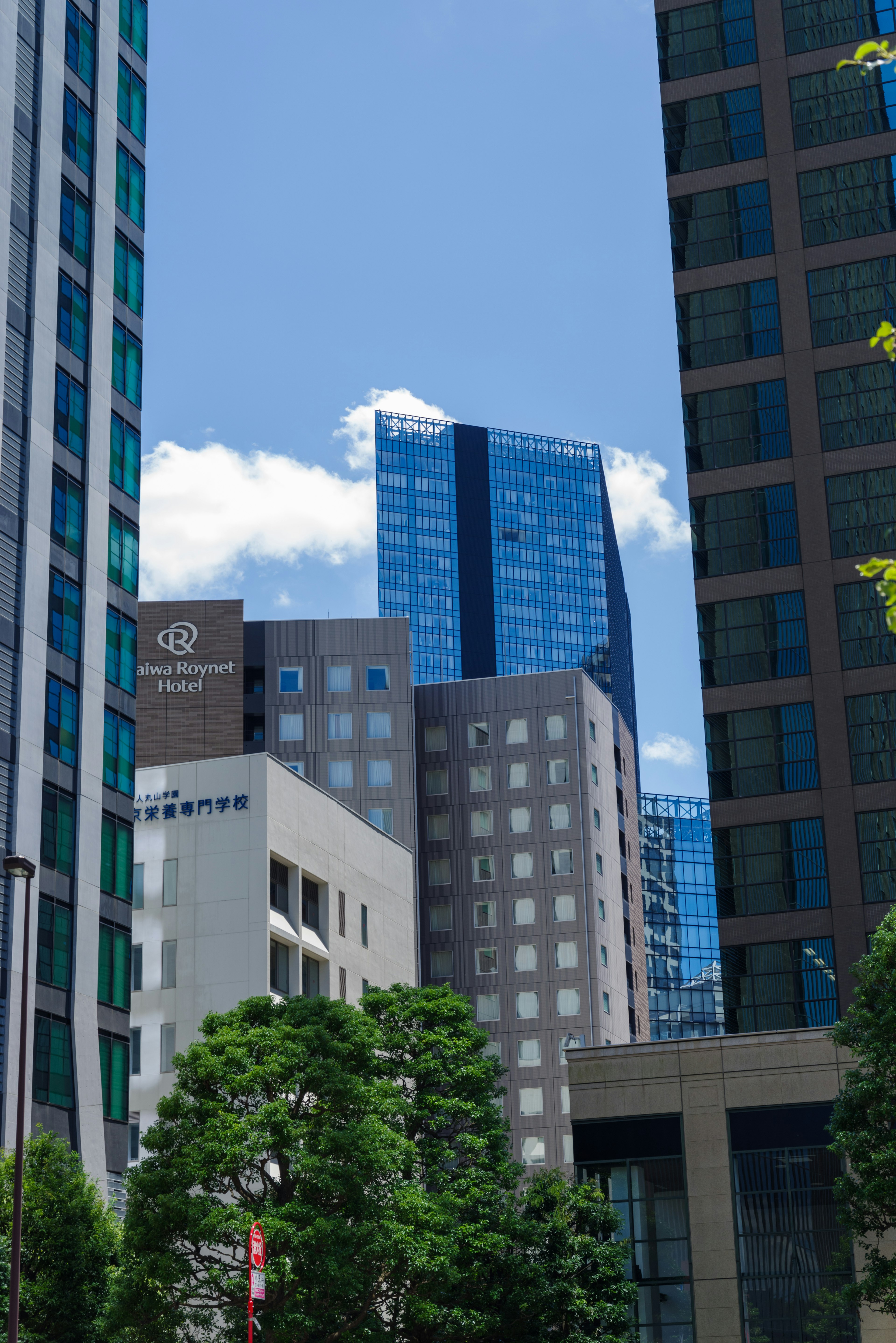 Cityscape featuring tall buildings and blue sky